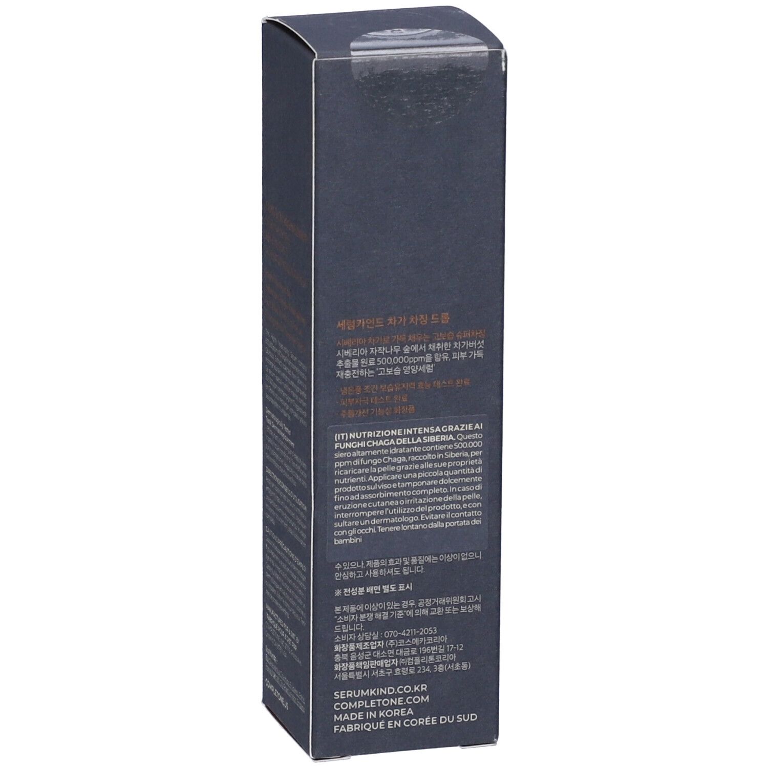 Confezione del prodotto grigio scuro con testo multilingue. Logo vegano e altri marchi visibili.