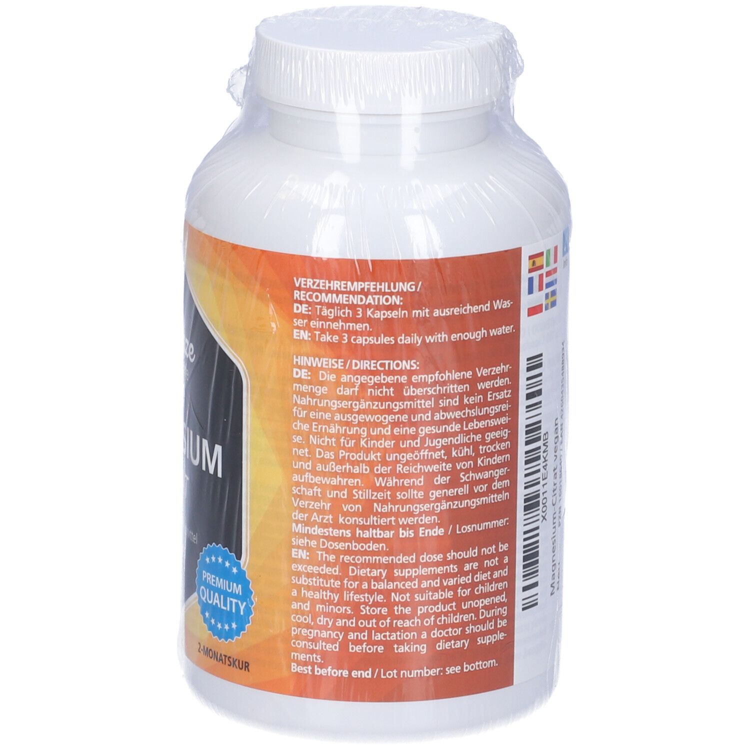 Retro del flacone. Raccomandazioni, informazioni produttore. Scritta: Magnesium Citrat, cura di 2 mesi.