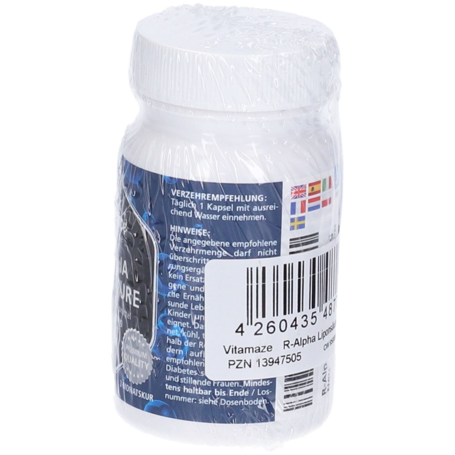 Flacone bianco con etichetta blu. Codice a barre e informazioni. 19,5g, 60 capsule. Bandiere multilingue.