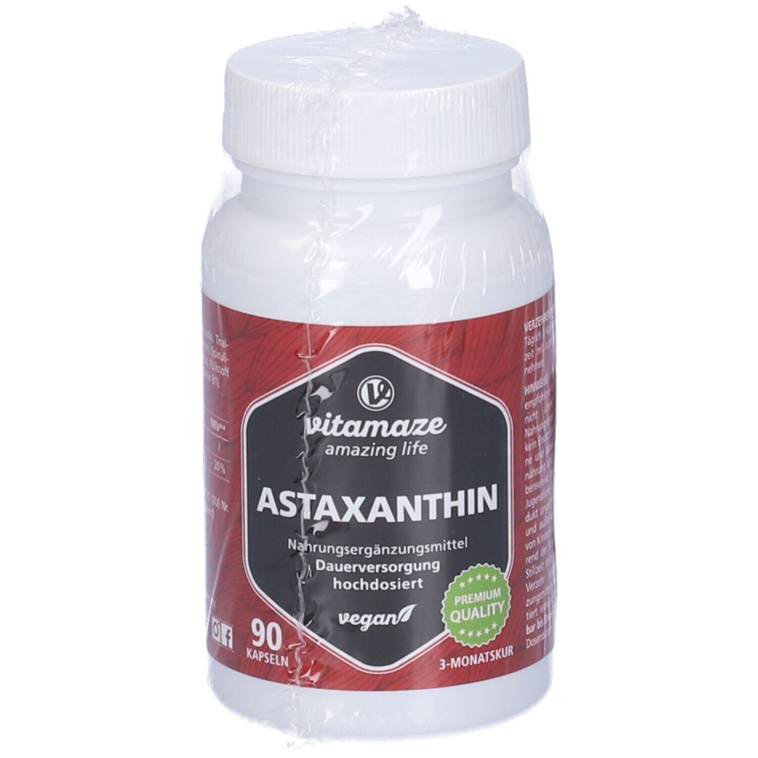 Flacone bianco di capsule di astaxantina. Etichetta nera con nome del prodotto e logo. 90 capsule, vegano, cura di 3 mesi.