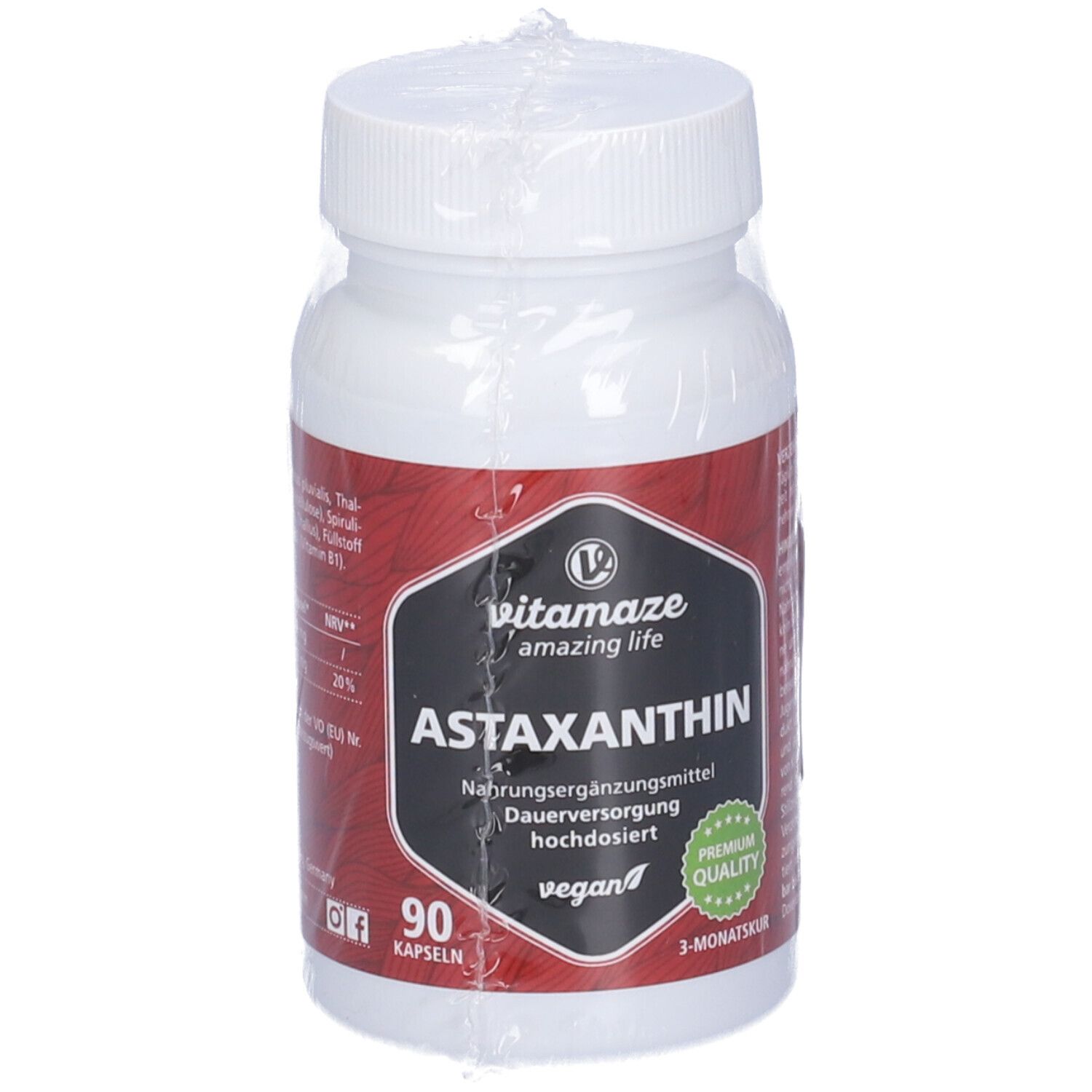 Flacone bianco di capsule di astaxantina. Etichetta nera con nome del prodotto e logo. 90 capsule, vegano, cura di 3 mesi.