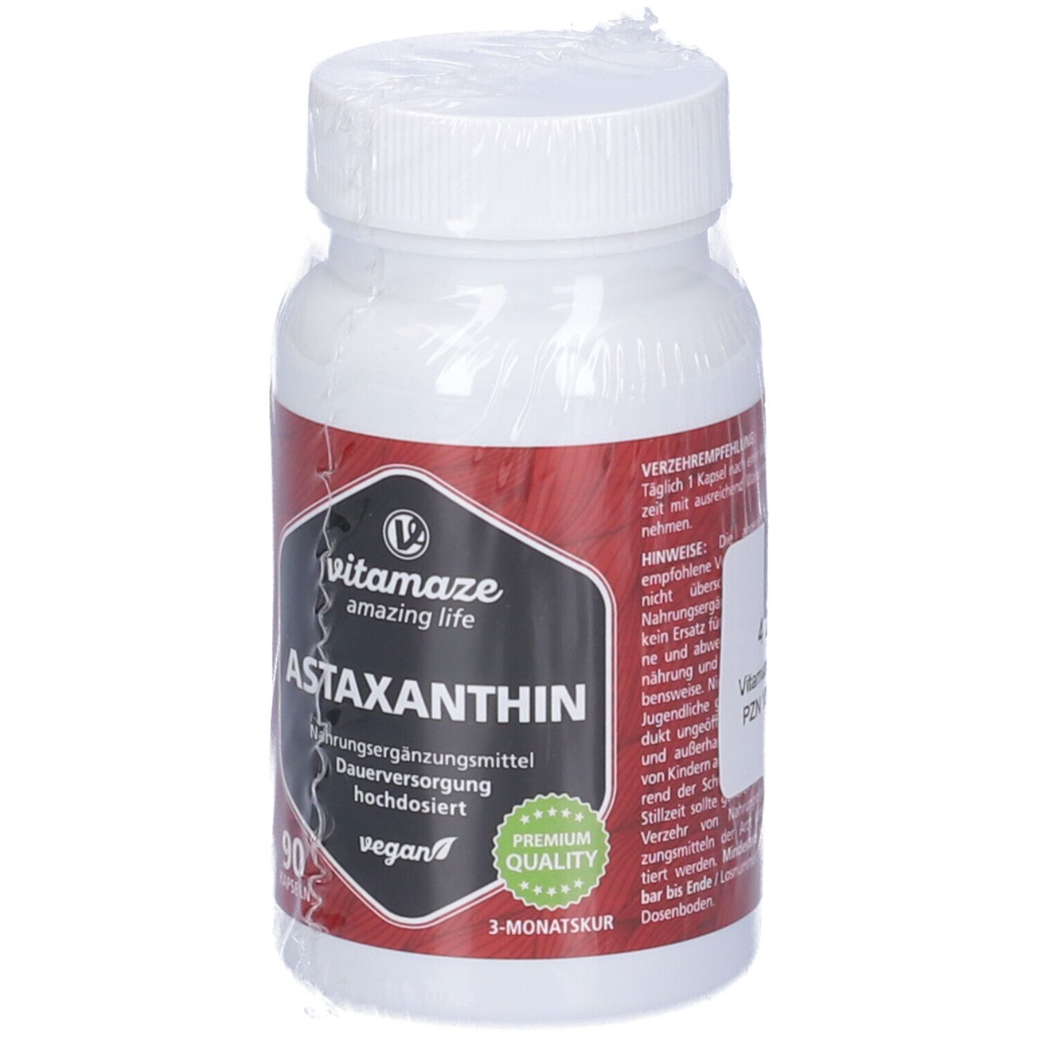 Flacone bianco di capsule di astaxantina. Etichetta nera con nome del prodotto e logo. 90 capsule, vegano, cura di 3 mesi.