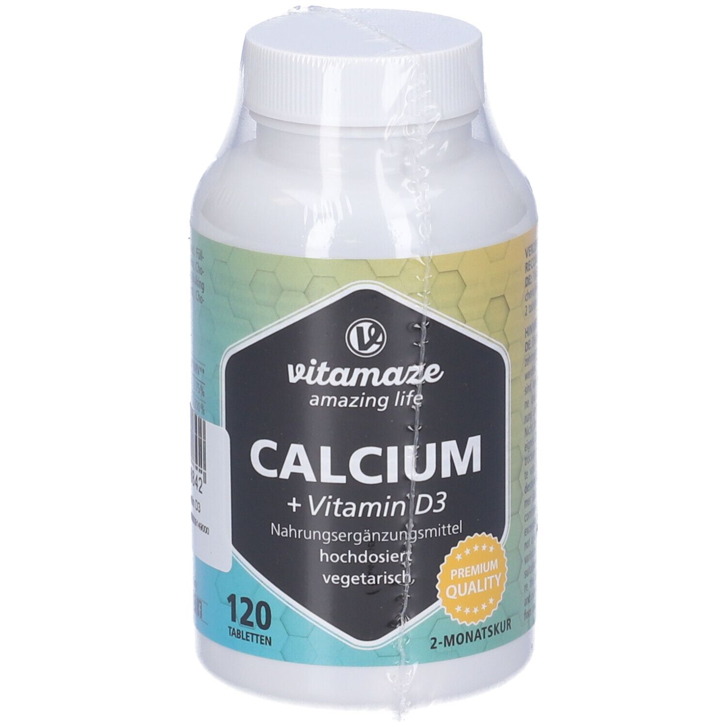 Flacone bianco di compresse con etichetta. Scritta: Calcium + Vitamina D3. 120 compresse. Vegetariano.