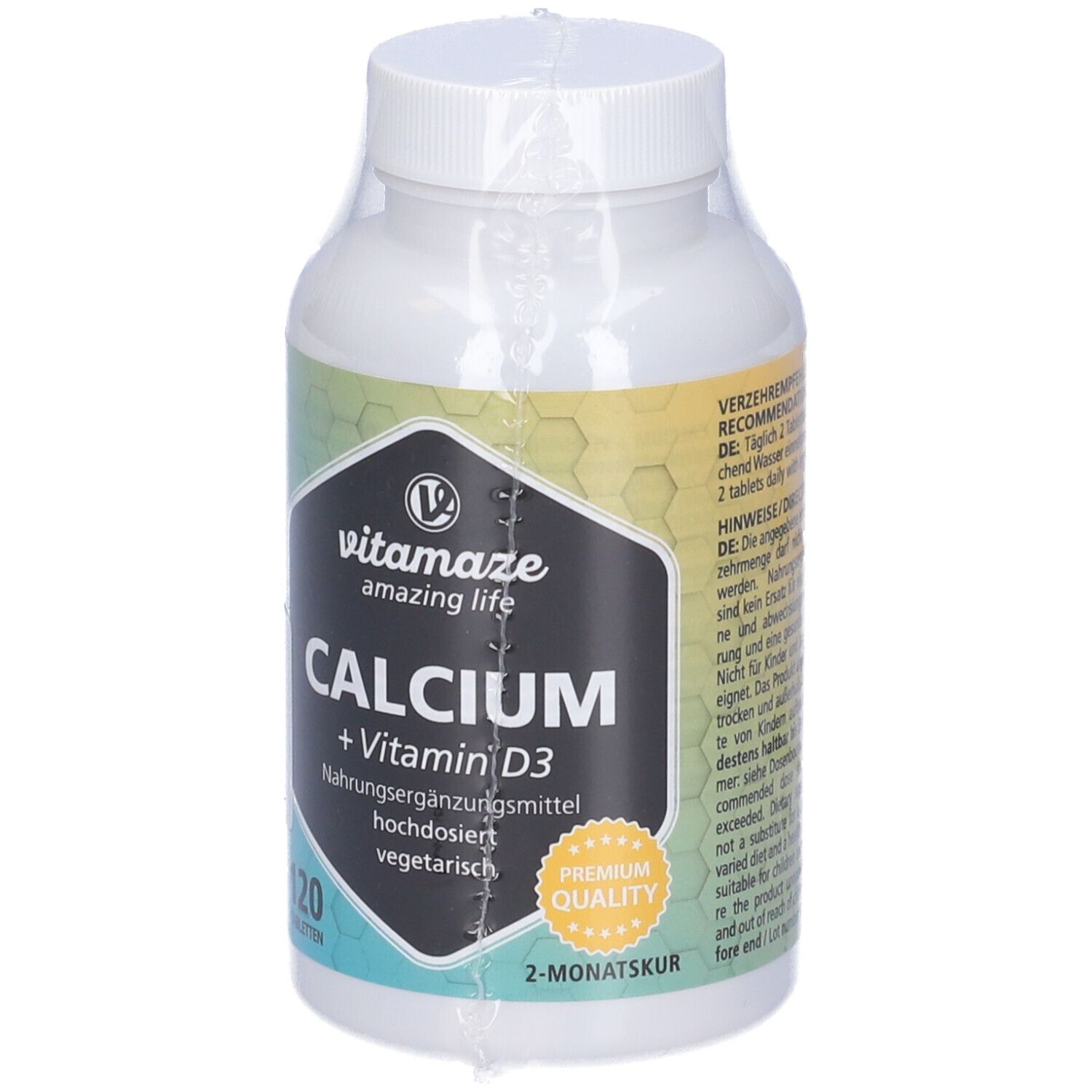 Flacone bianco di compresse con etichetta. Scritta: Calcium + Vitamina D3. 120 compresse. Vegetariano.