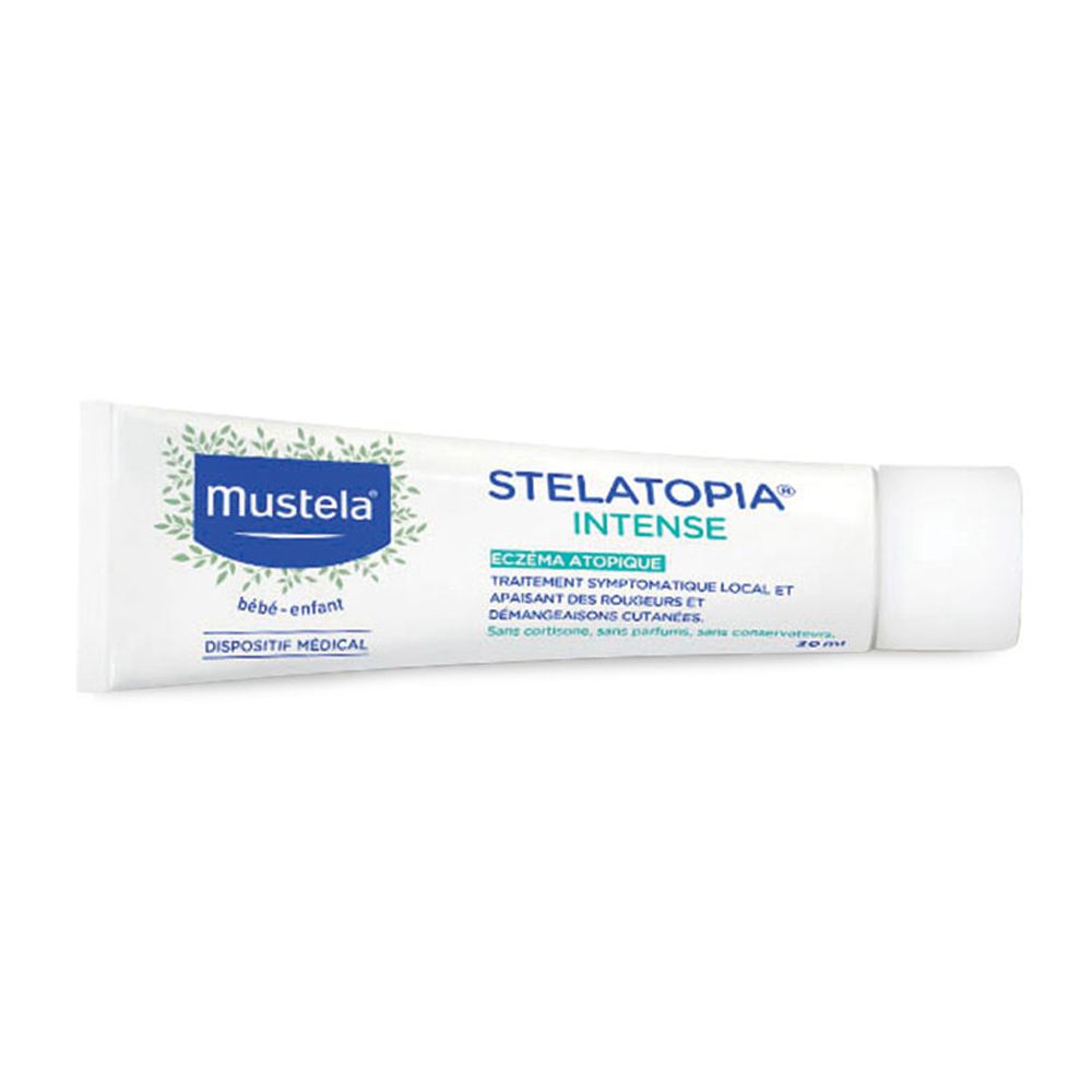 Weiße Tube mit blau-grüner Beschriftung. Aufschrift: Mustela, Stelatopia Intense, bébé-enfant. Medizinprodukt.