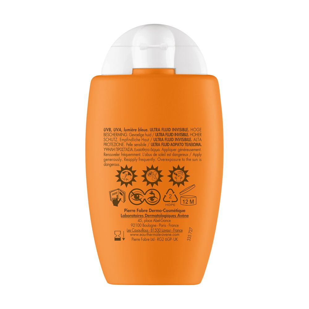 Retro del flacone arancione. Testo: Protezione UV, ingredienti, avvertenze, informazioni produttore.