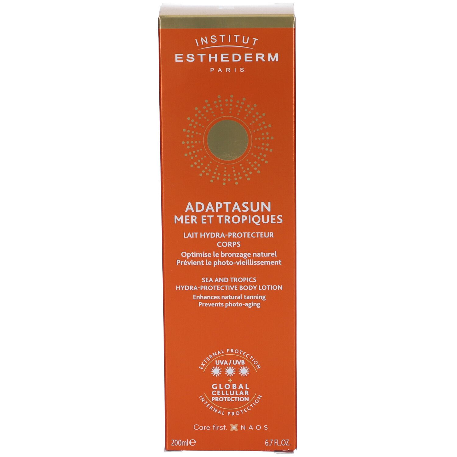 Confezione del prodotto arancione. Scritta: Institut Esthederm, Adaptasun Mer et Tropiques, Lait Hydra-Protecteur Corps.