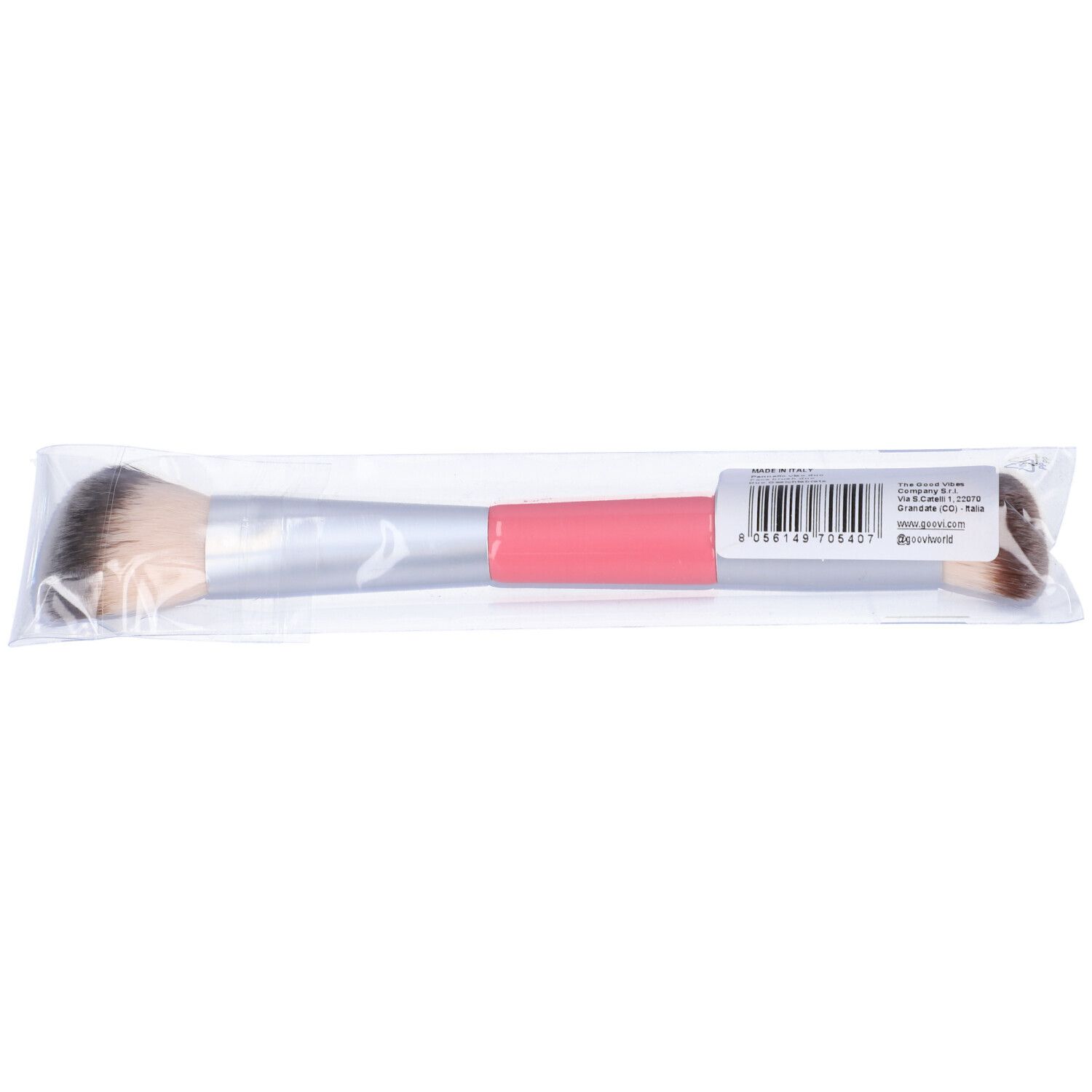 Pennello doppio viso in confezione di plastica. Fascia rosa con scritta "goovi". Codice a barre e testo sulla confezione.