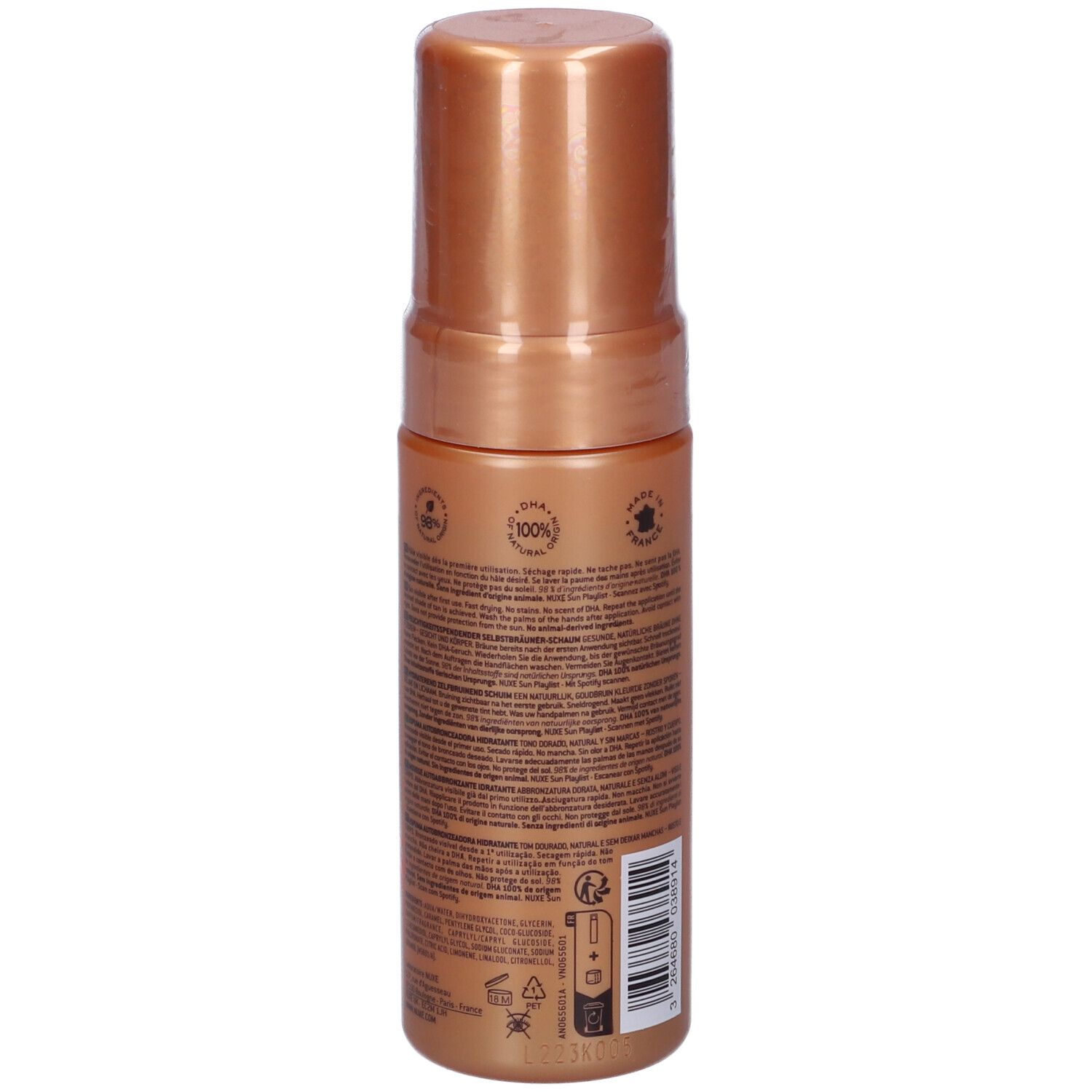Retro del flacone di mousse autoabbronzante. Colore marrone dorato. Testo e loghi.