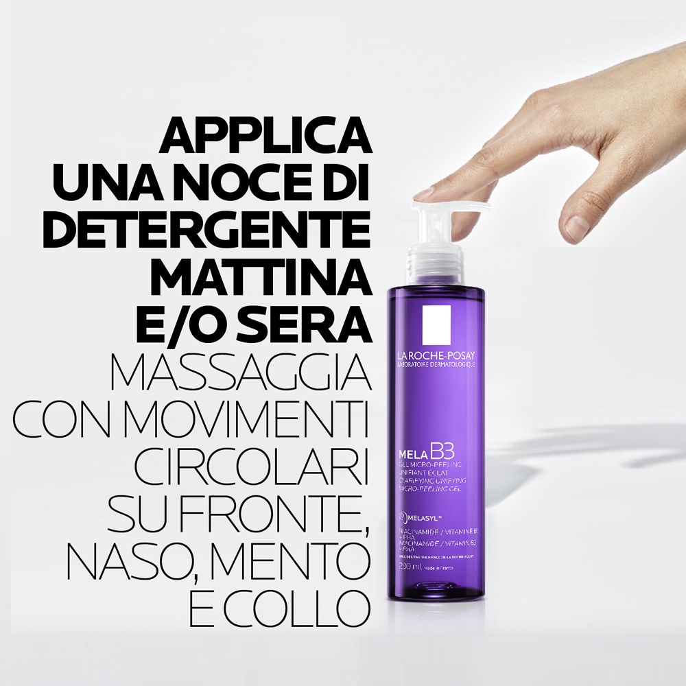 Mano preme il dosatore. Flacone La Roche-Posay Mela B3 Gel. Testo.