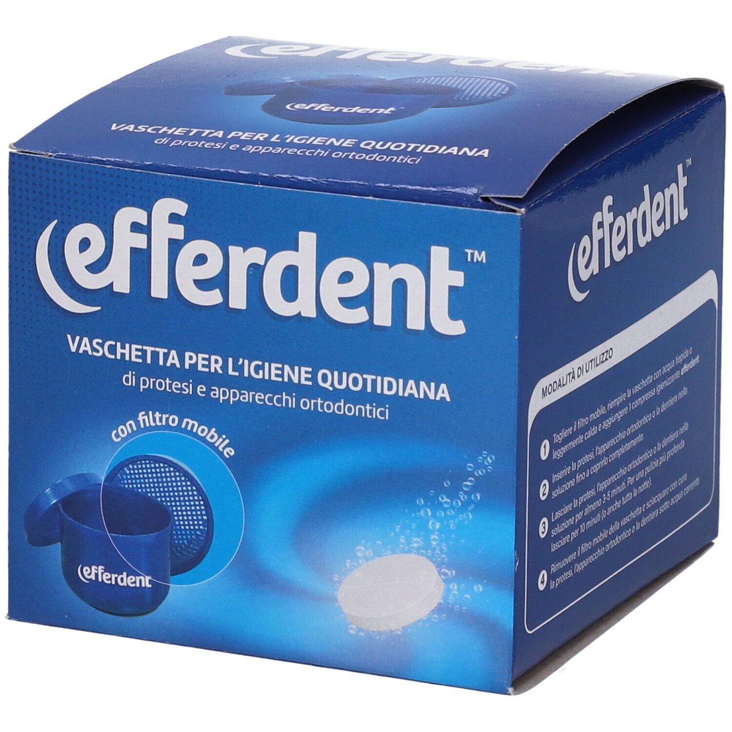 Scatola blu 'Efferdent'. Contiene vaschetta portaprotesi e compressa. Testo: 'Vaschetta per l'igiene quotidiana di protesi'.
