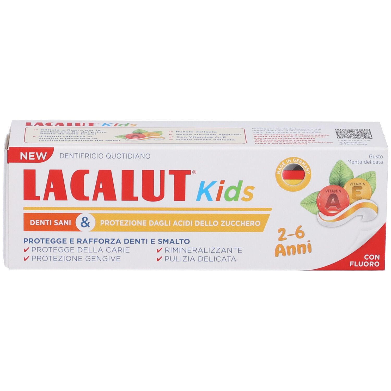 Confezione di dentifricio. Scritta LACALUT Kids, 2-6 Anni, con fluoro. Contiene vitamine A ed E. Bandiera tedesca.