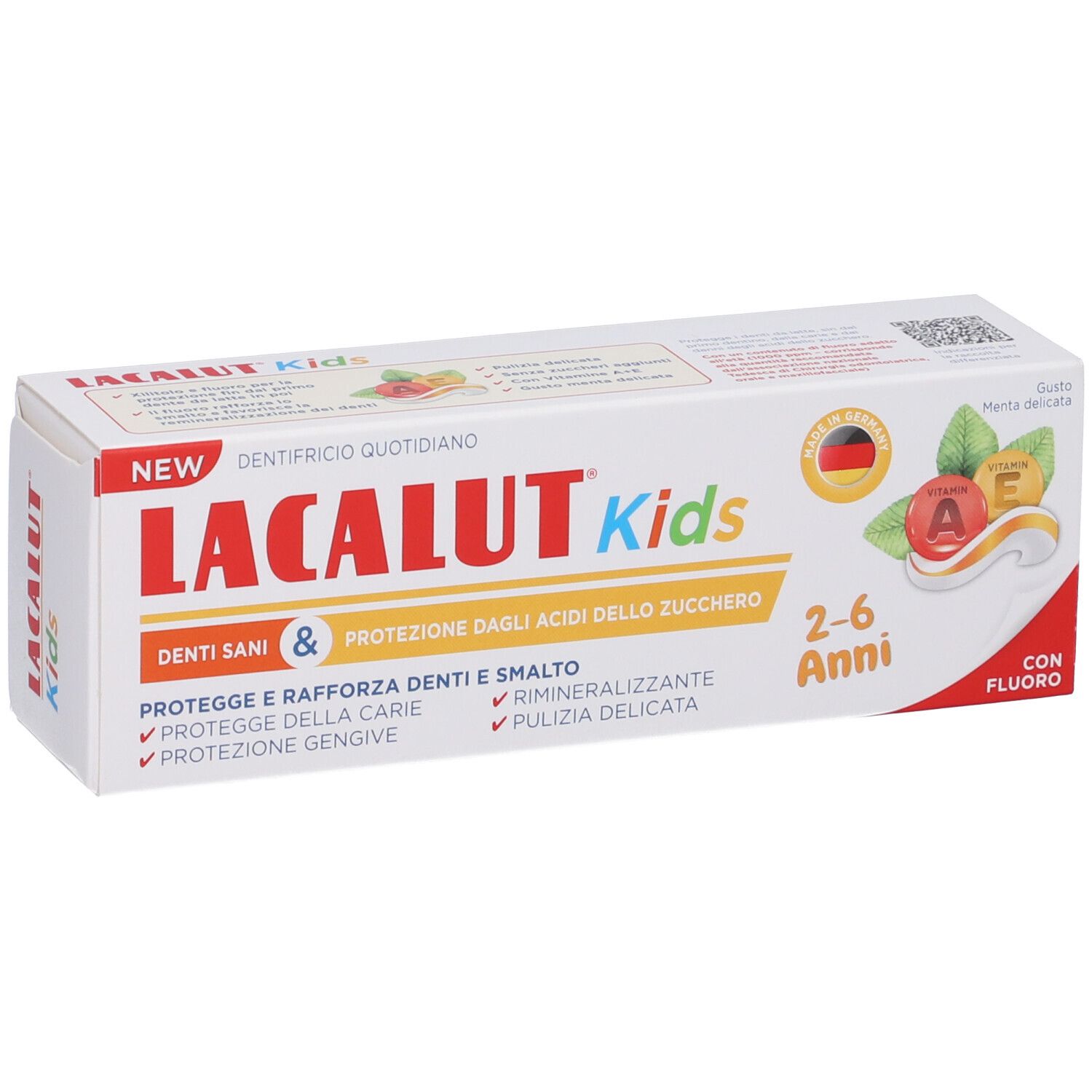Confezione di dentifricio. Scritta LACALUT Kids, 2-6 Anni, con fluoro. Contiene vitamine A ed E. Bandiera tedesca.