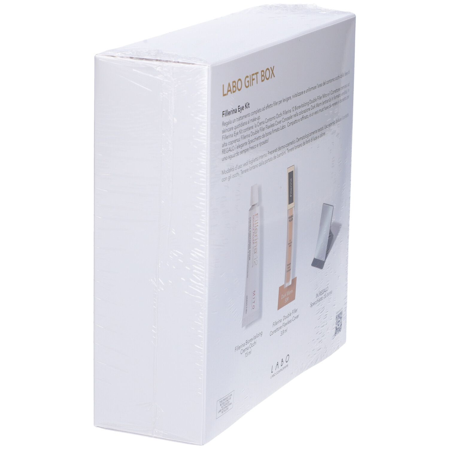 Scatola "LABO GIFT BOX" inclinata con prodotti "Fillerina Eye Kit" e specchietto. Testo in italiano.