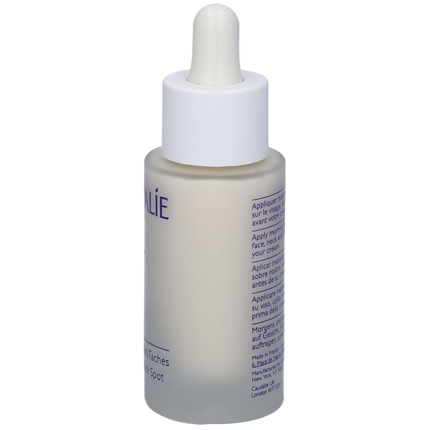 Retro del flacone di siero Caudalie Vinoperfect. Testo bianco su sfondo bianco. Istruzioni per l'uso multilingue.