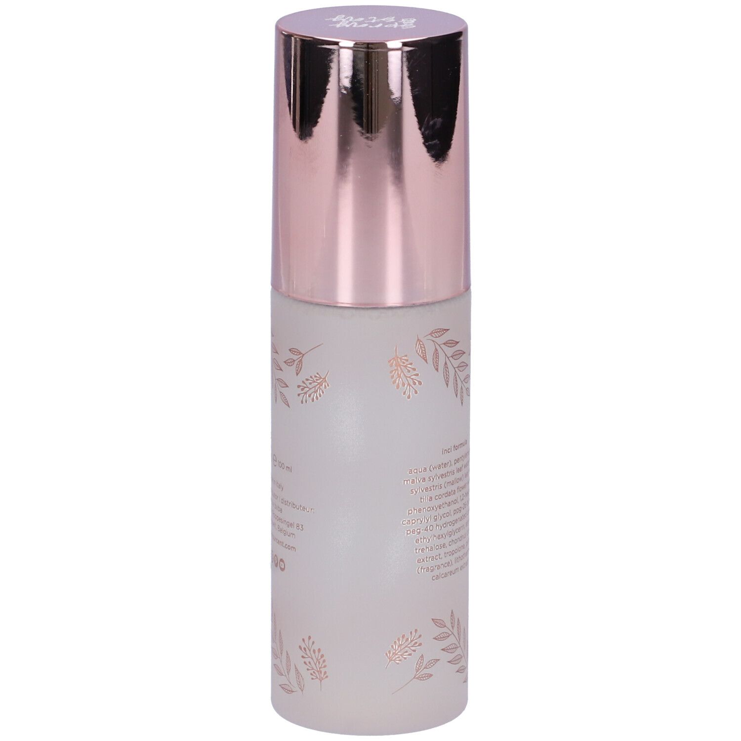 Spray fissante con tappo color oro rosa. Scritta: Cent Pur Cent, Le Fixeur. Flacone bianco opaco con motivo floreale.