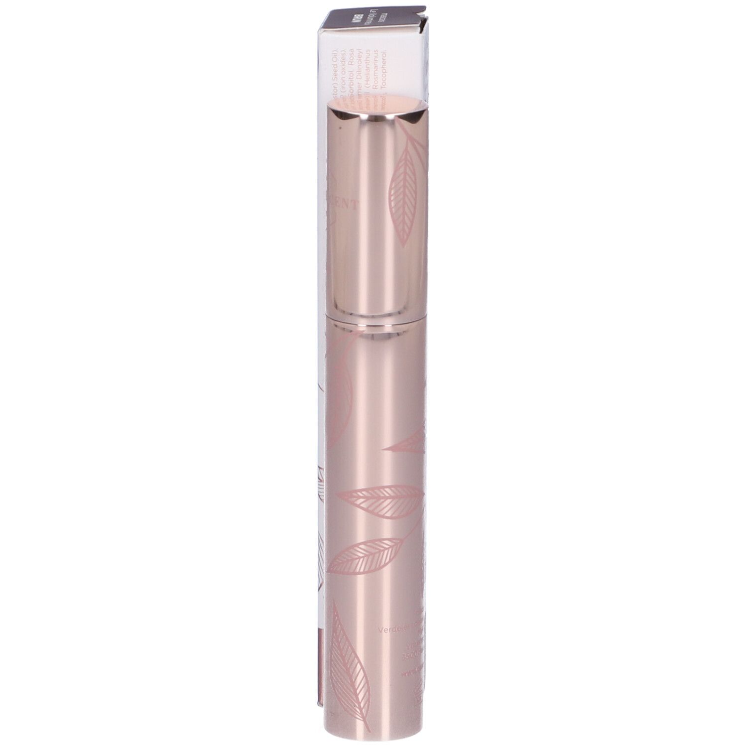 Tubo mascara in metallo rosa. Confezione con motivo a foglie e nome del prodotto.