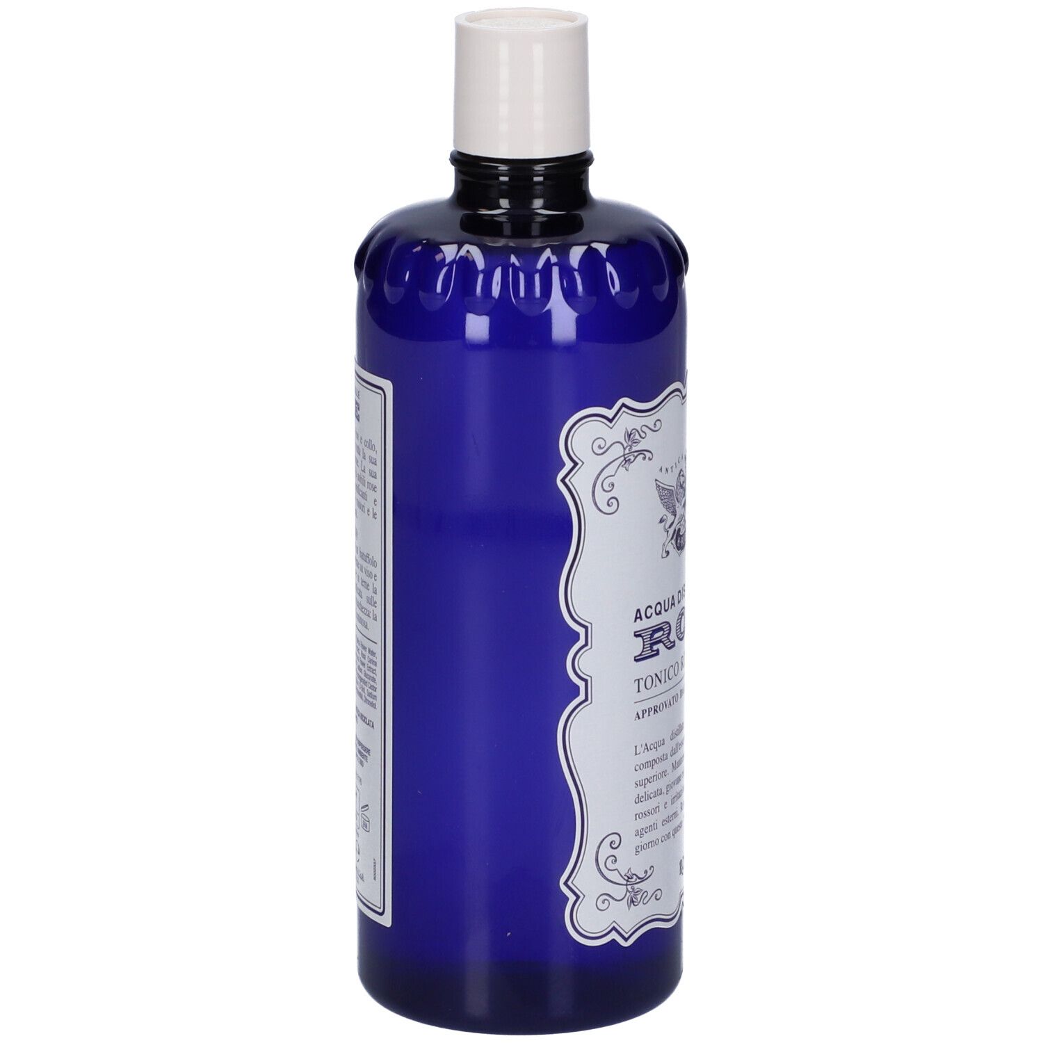 Bottiglia blu, vista laterale. Etichetta bianca con testo. Tappo bianco. Nome prodotto: Acqua Distillata Alle Rose Tonico Rinfrescante.