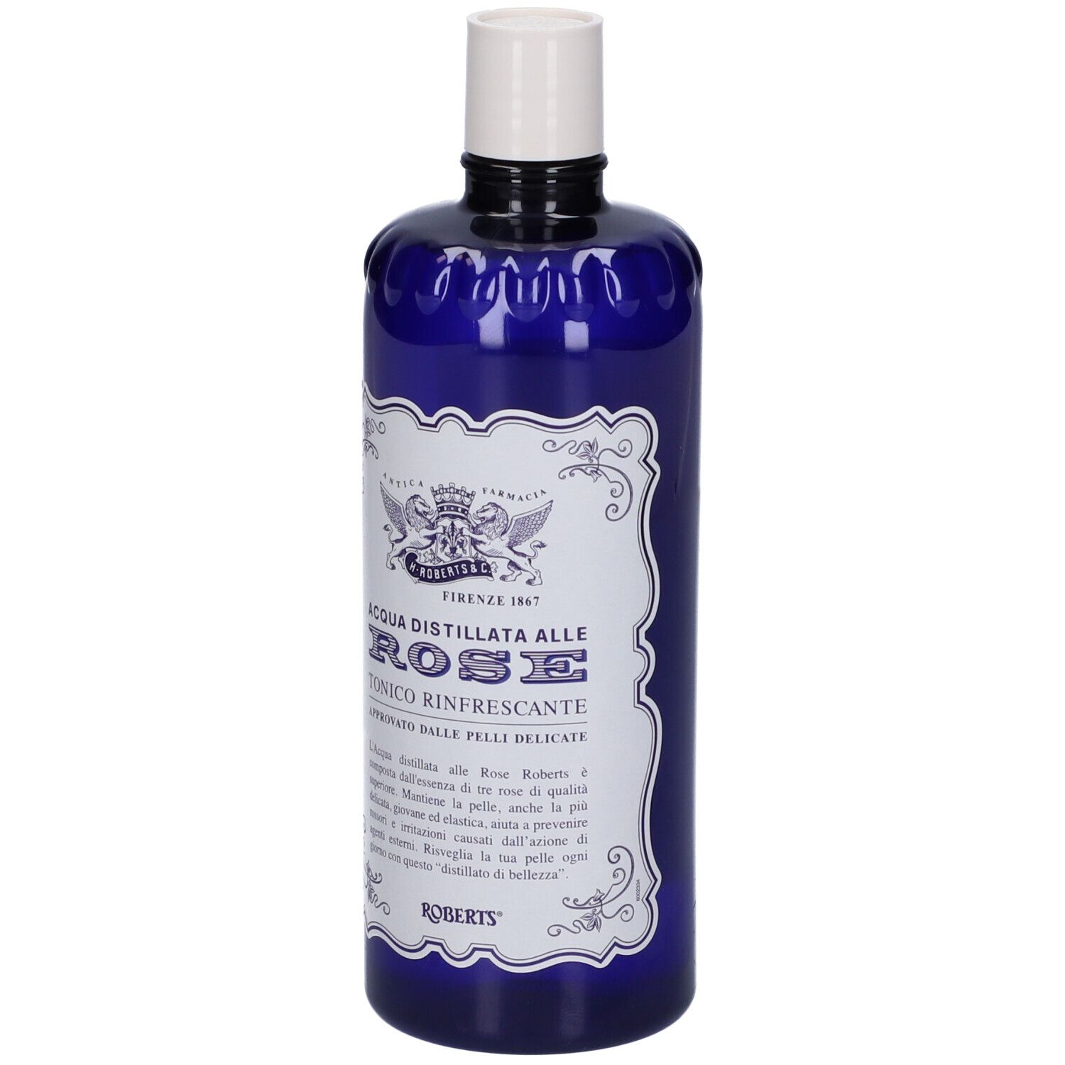 Bottiglia blu con tappo bianco. Etichetta con testo e logo. Nome prodotto: Acqua Distillata Alle Rose Tonico Rinfrescante.