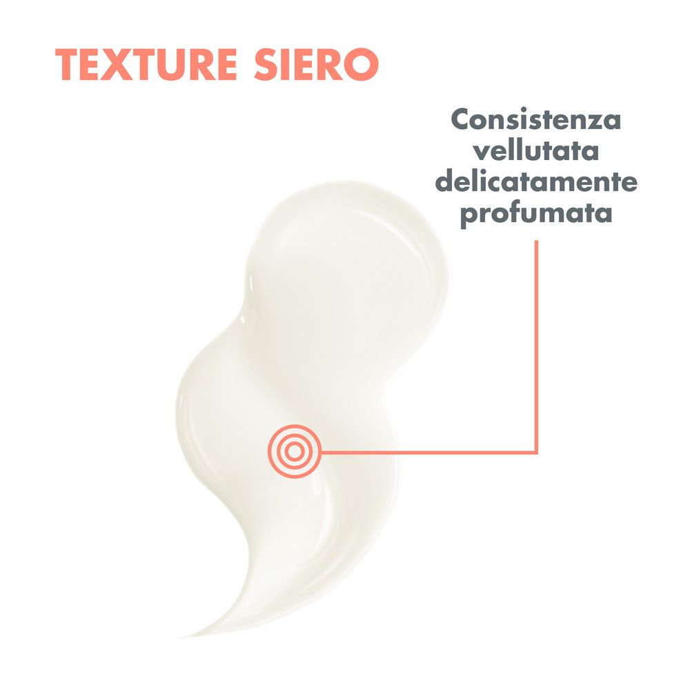 Primo piano di una sostanza cremosa bianca. Testo: Texture Siero. Consistenza vellutata, delicatamente profumata.