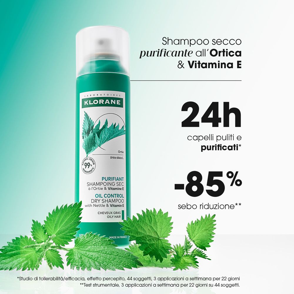 Klorane Trockenshampoo mit Brennnessel und Vitamin E in einer grünen Dose.