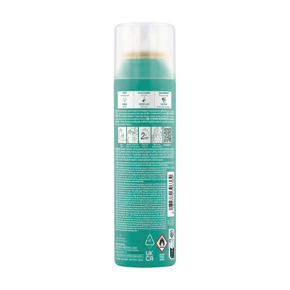 Rückseite einer türkisfarbenen Aerosoldose mit goldenem Ring und durchsichtigem Deckel. Enthält Text und Symbole.