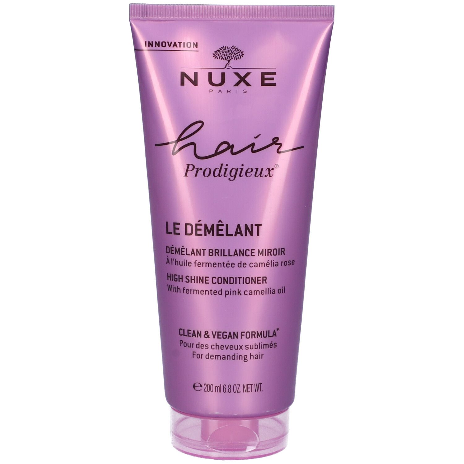 Tubo lilla con testo del prodotto. NUXE Paris, Hair Prodigieux, Le Démêlant. High Shine Conditioner. Formula chiara e vegana.