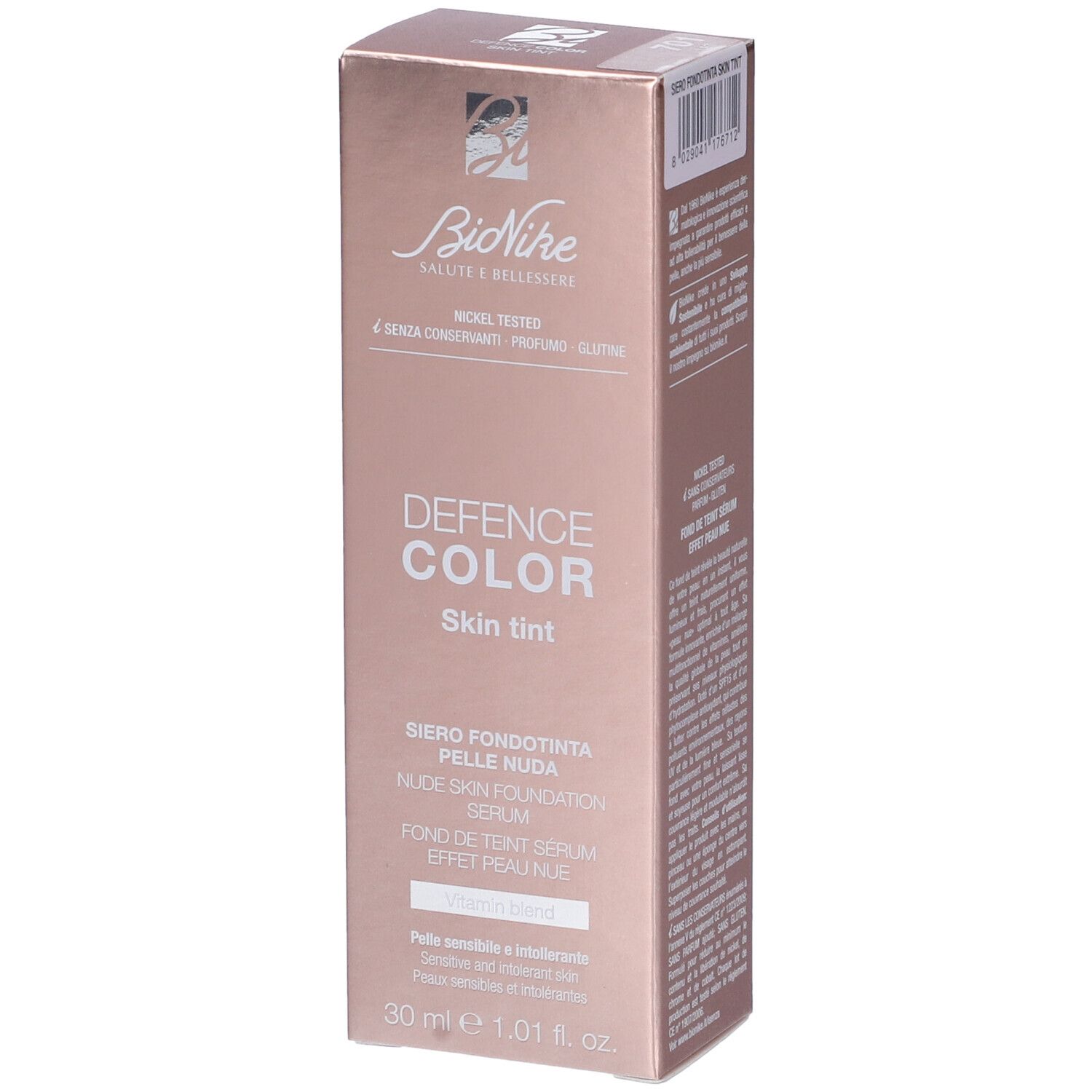 Confezione rosa con informazioni prodotto. Marchio Bionike, nome Defence Color Skin Tint. Dettagli ingredienti e certificazioni.