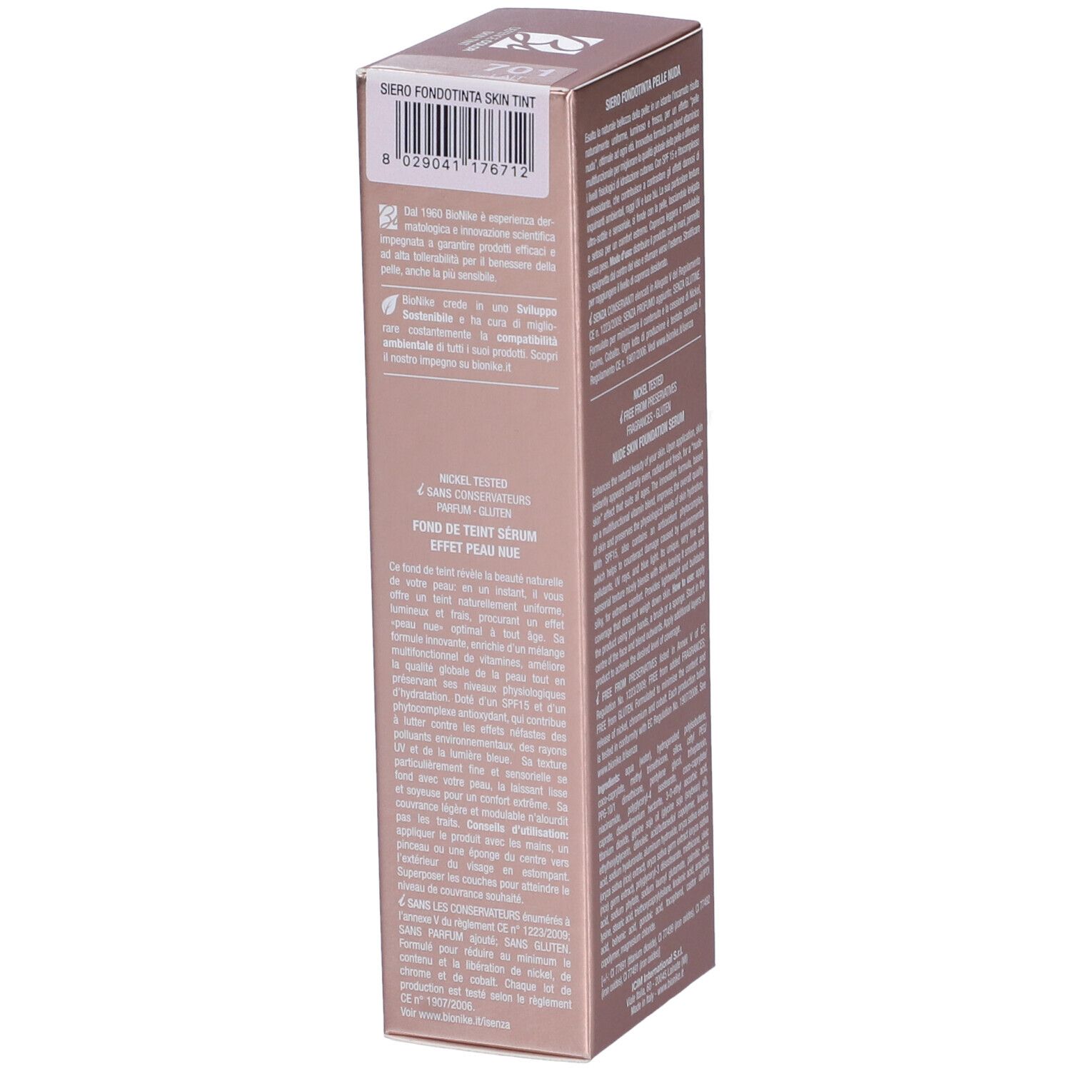 Confezione rosa, vista laterale. Testo: Bionike, Defence Color Skin Tint. Codice a barre e informazioni prodotto.