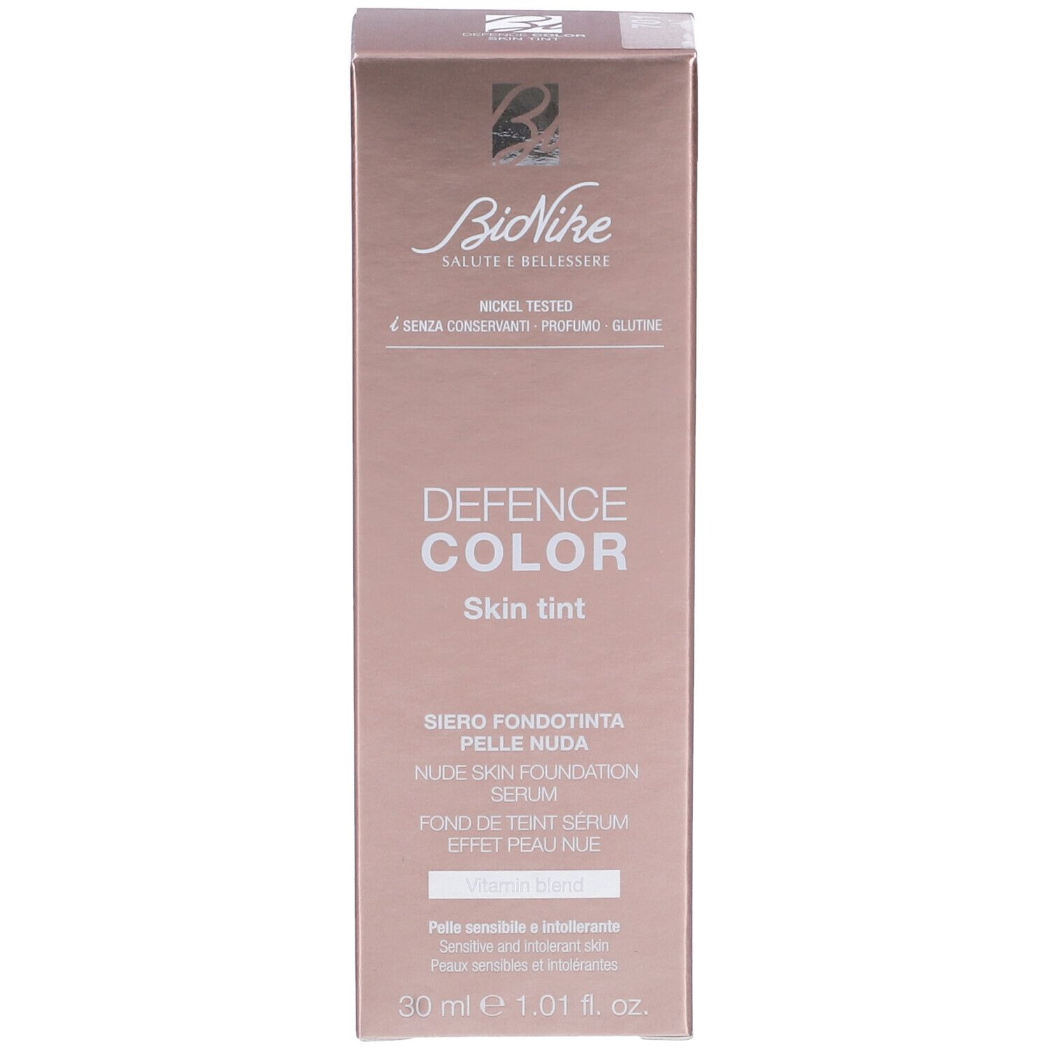 Confezione rosa con informazioni prodotto. Marchio Bionike, Defence Color Skin Tint. Testo: Vitamin Blend.