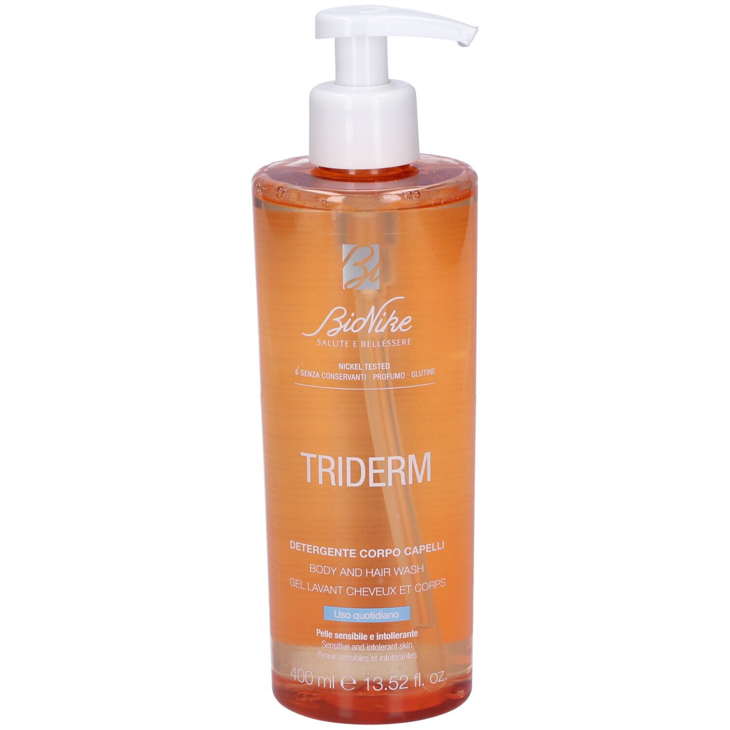 Flacone trasparente con dosatore. Scritta: TRIDERM, Detergente Corpo Capelli, Body and Hair Wash, Gel Lavant Cheveux et Corps.