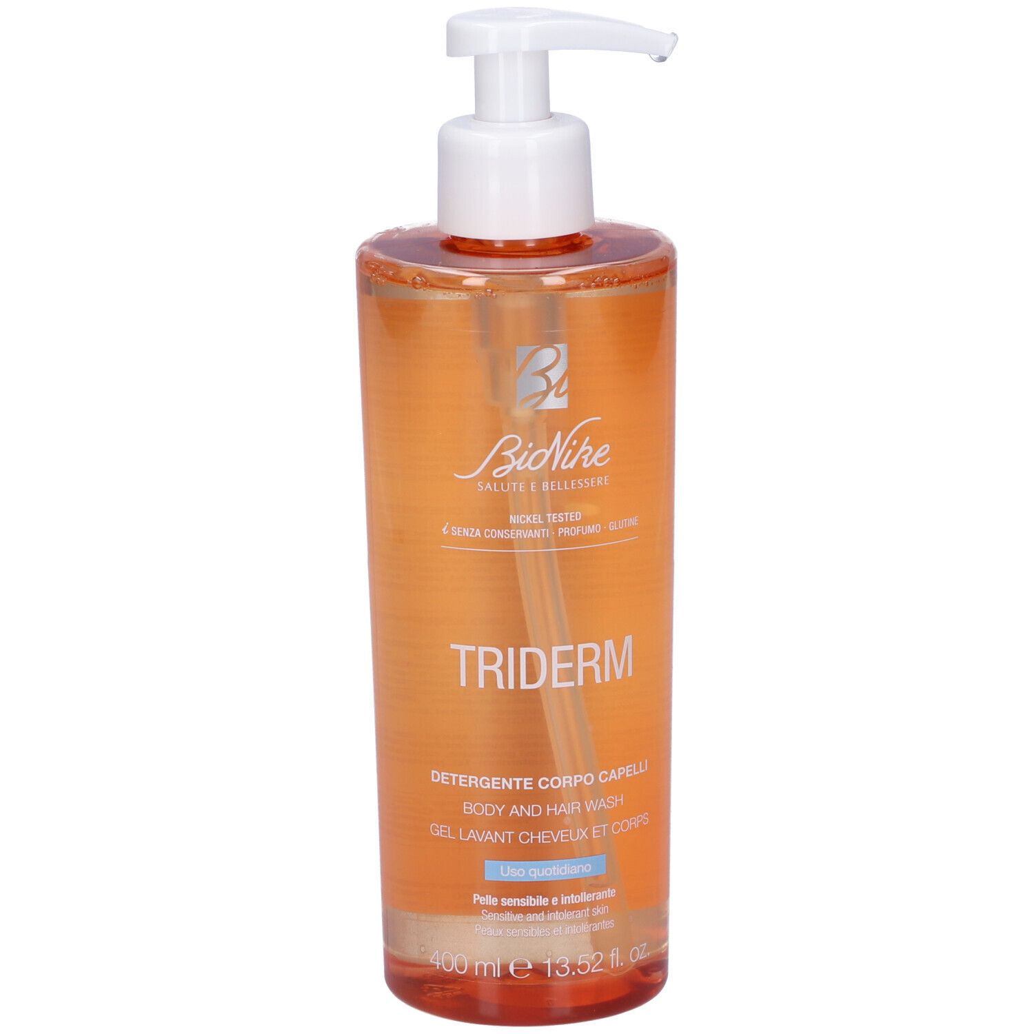 Flacone trasparente con dosatore. Scritta: TRIDERM, Detergente Corpo Capelli, Body and Hair Wash, Gel Lavant Cheveux et Corps.