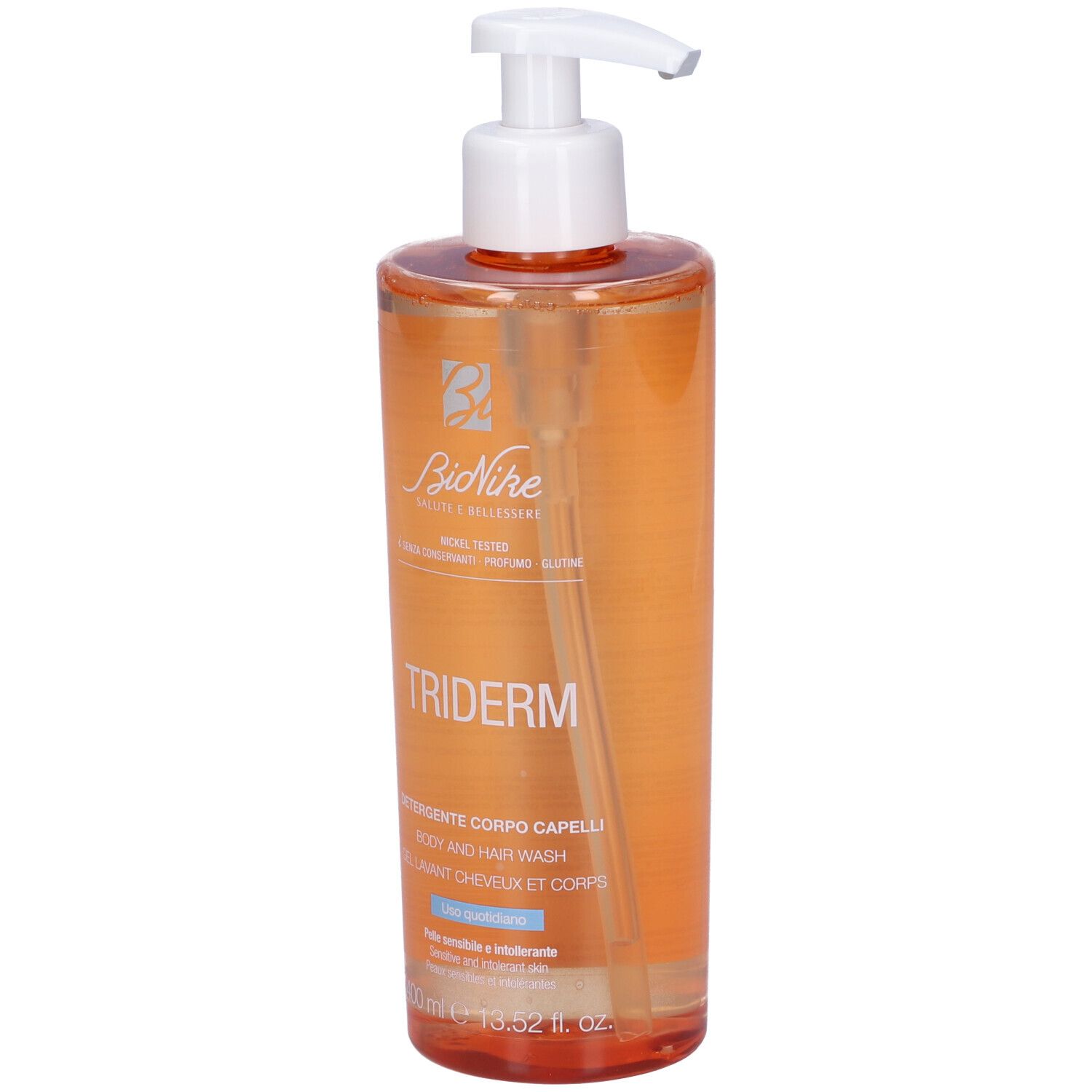 Flacone trasparente con dosatore. Scritta: TRIDERM, Detergente Corpo Capelli, Body and Hair Wash, Gel Lavant Cheveux et Corps.