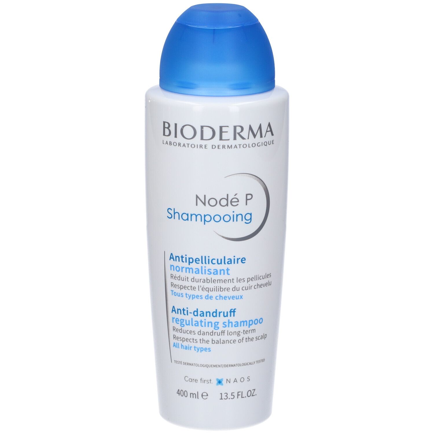 Flacone bianco con tappo blu. Scritta: Bioderma Nodé P Shampooing. Testo: Antiforfora, regolatore.