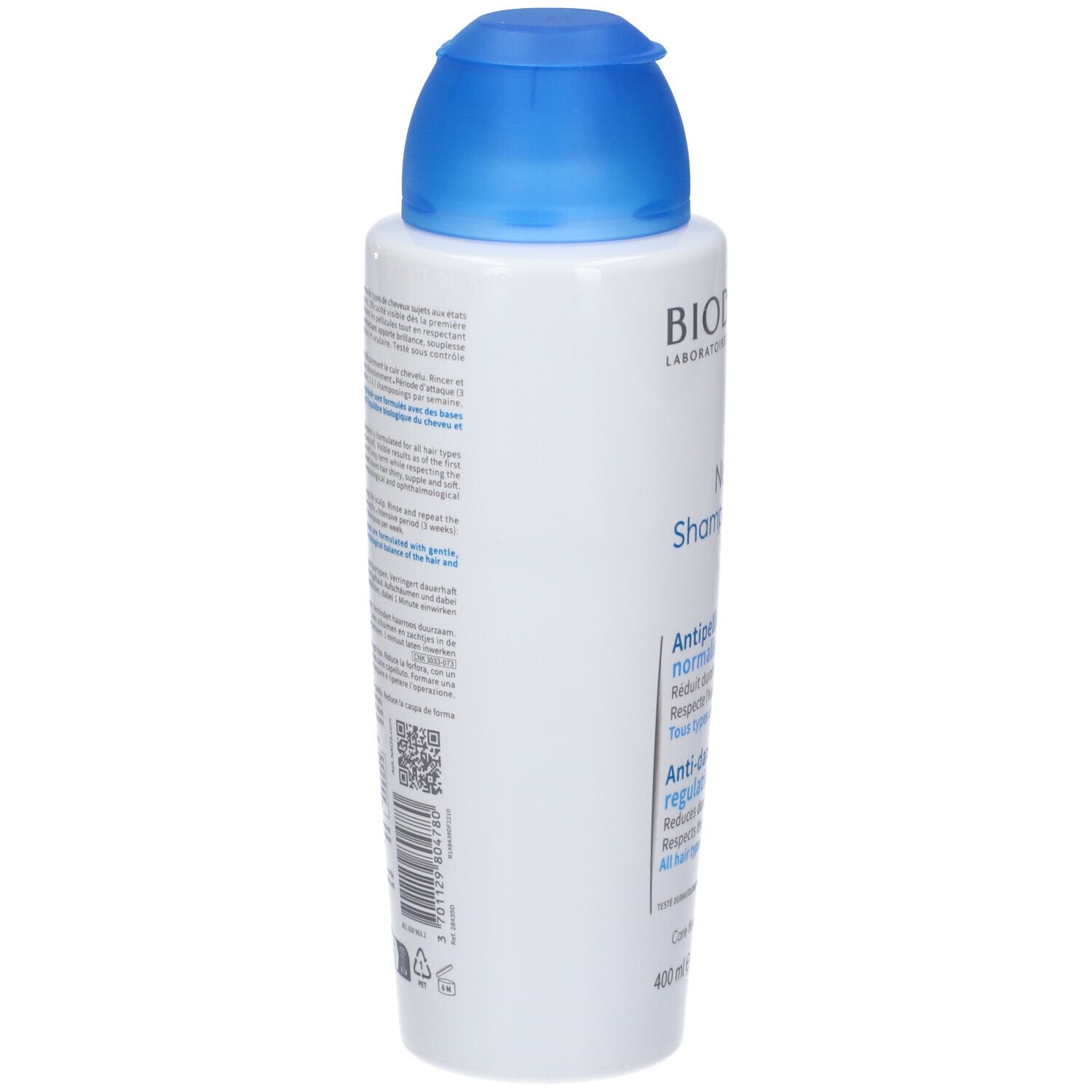 Flacone bianco, tappo blu. Retro con testo. Bioderma Nodé P Shampooing. Codice QR e informazioni.