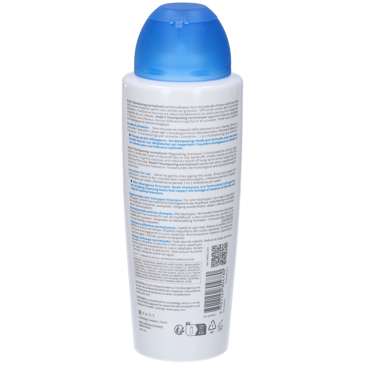 Retro del flacone bianco, tappo blu. Testo: Bioderma Nodé P Shampooing. Informazioni e codice QR.