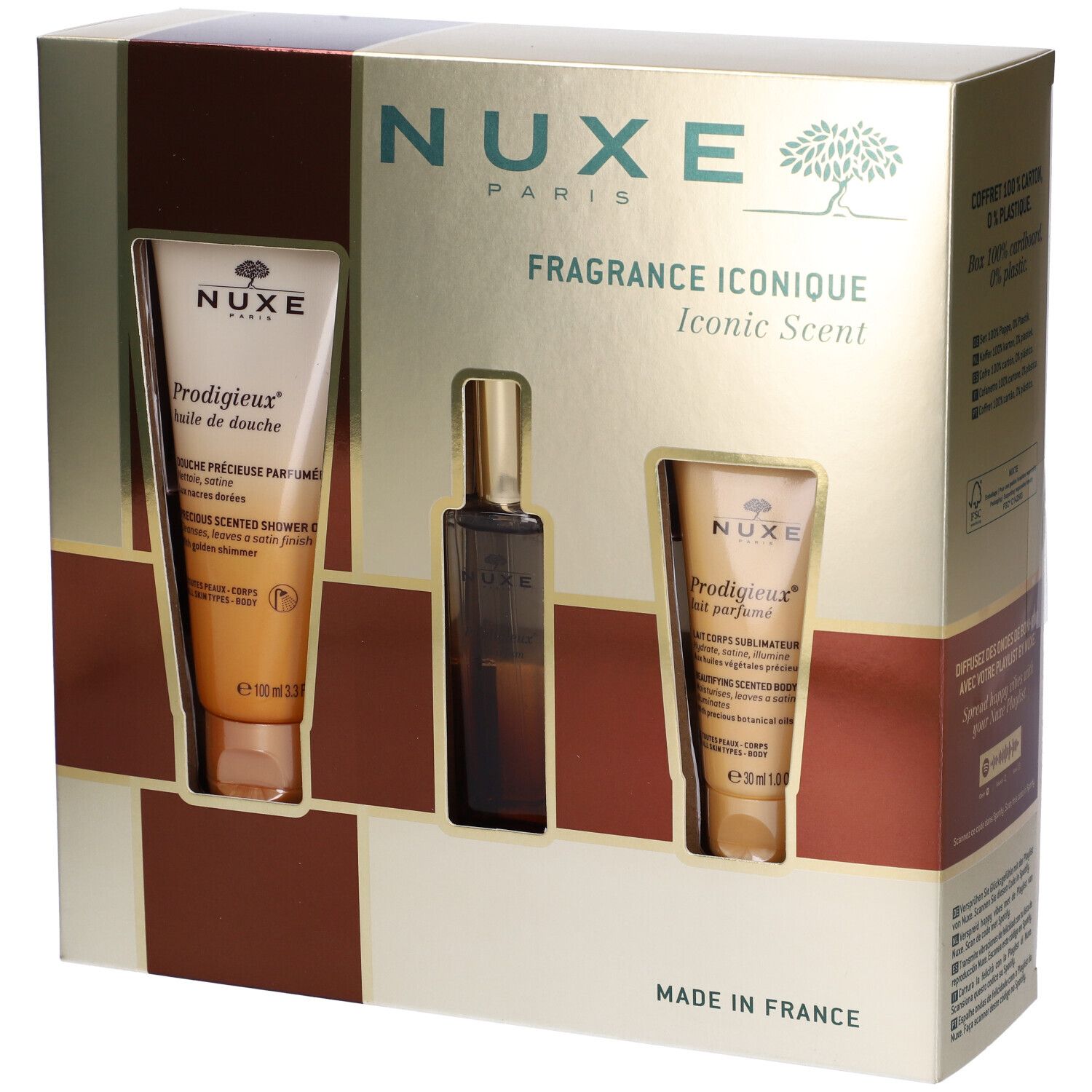 Confezione regalo con tre prodotti. Due tubi e una bottiglia in confezione dorata. Scritta: Nuxe Paris, Fragrance Iconique.