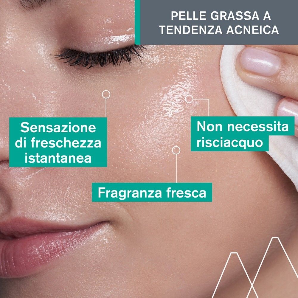 Viso con cotone. Testo: Esfoliante delicato, profumo fresco. Per pelli grasse con imperfezioni.