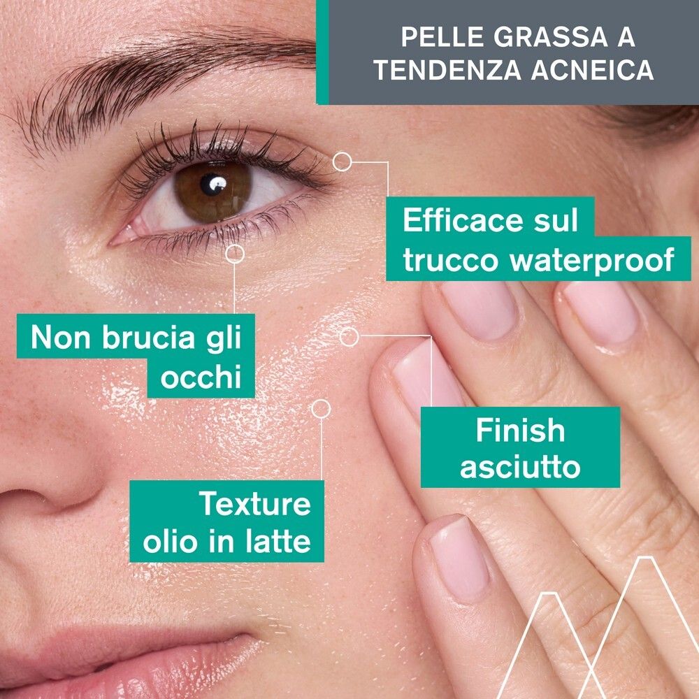 Primo piano di un viso. Testo: non brucia gli occhi, olio in latte, trucco waterproof.