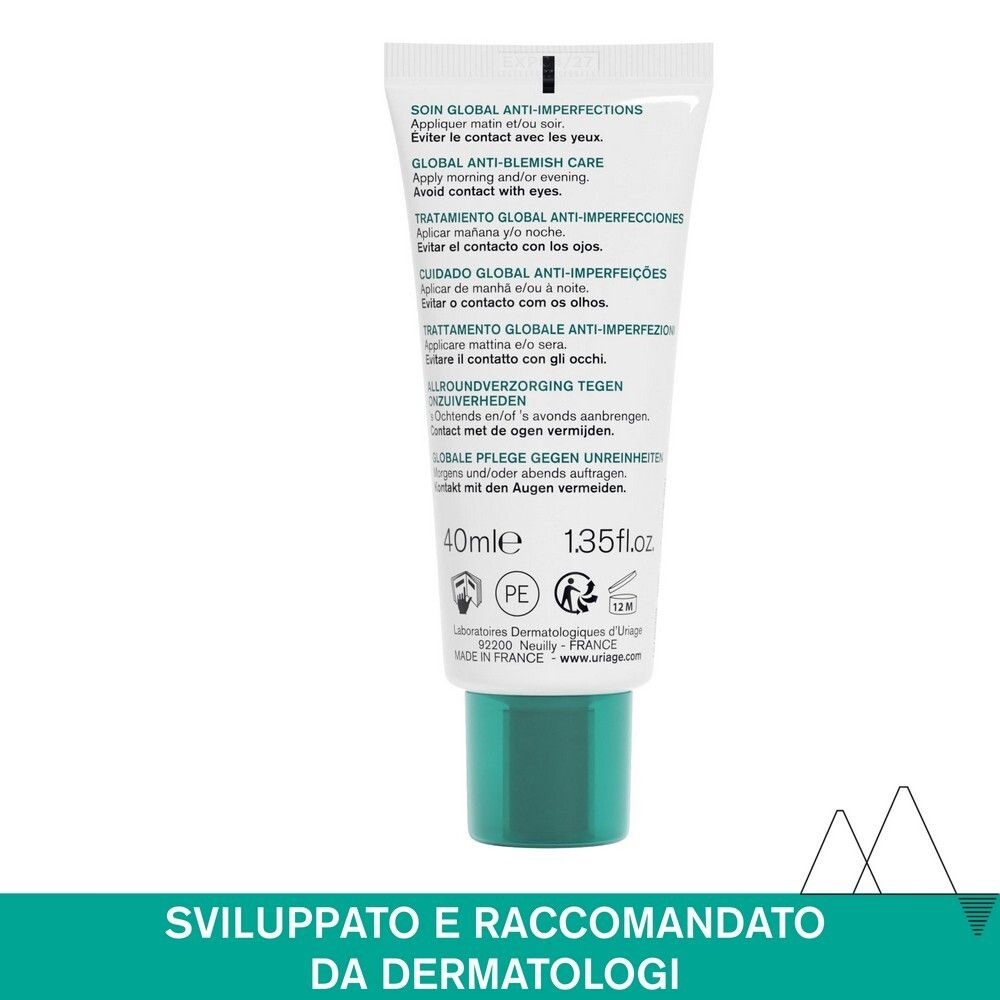 Retro del tubo. Testo multilingue: istruzioni per l'uso, ingredienti, indirizzo del produttore. Tappo verde.