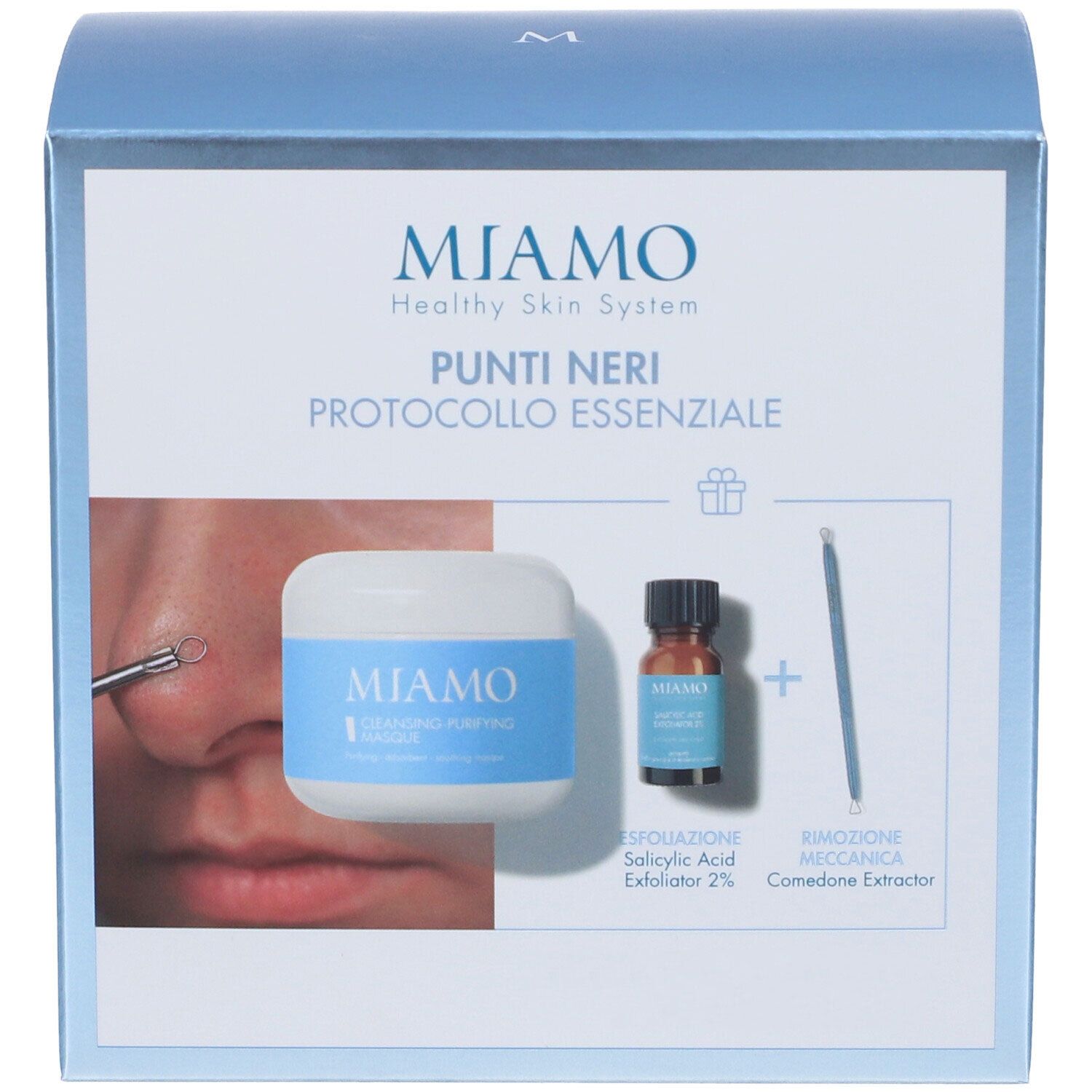 Confezione prodotto. Contiene crema, siero, estrattore. Scritta: Miamo, Punti Neri, Protocollo Essenziale. Con simbolo regalo.
