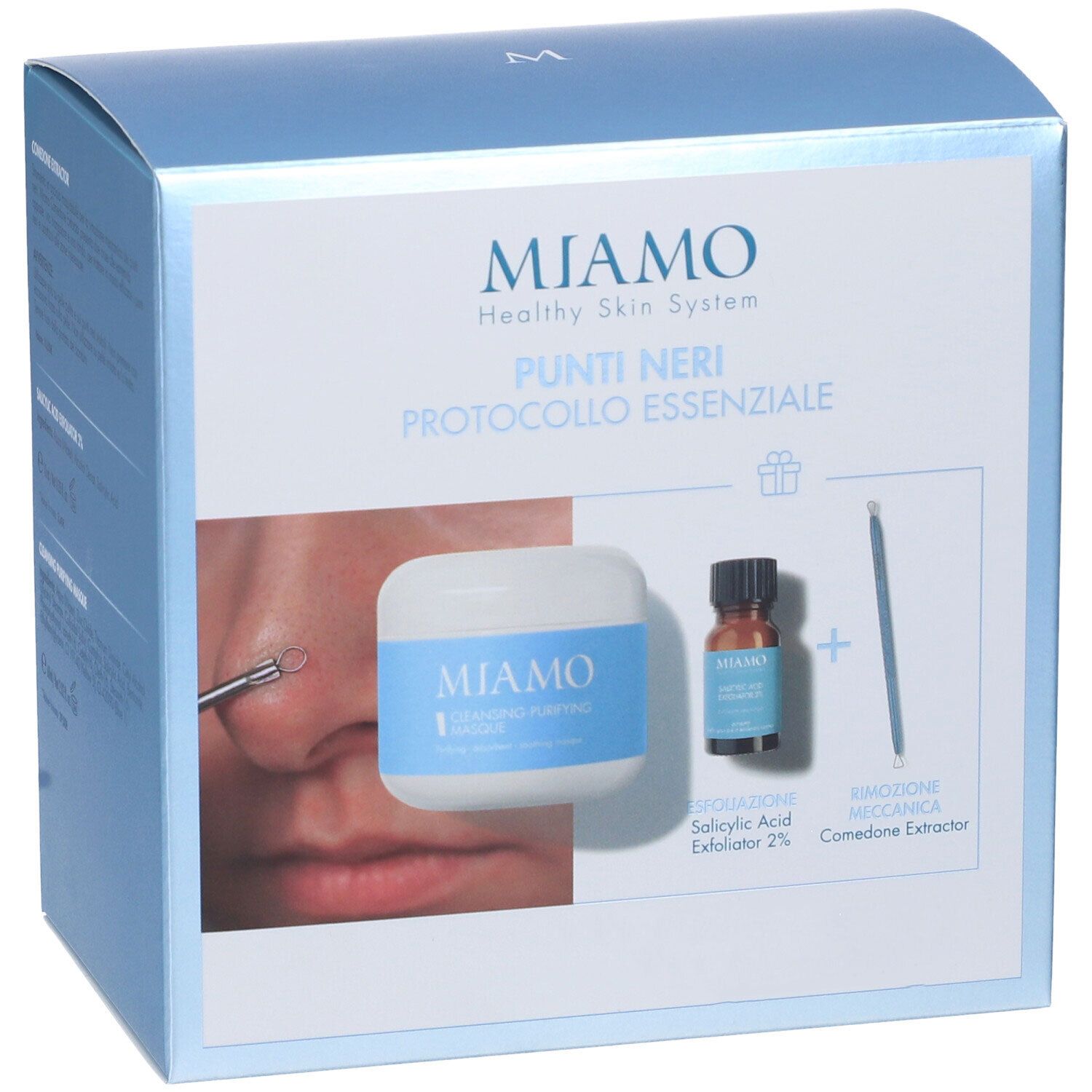 Confezione prodotto. Contiene crema, siero, estrattore. Scritta: Miamo, Punti Neri, Protocollo Essenziale. Con simbolo regalo.
