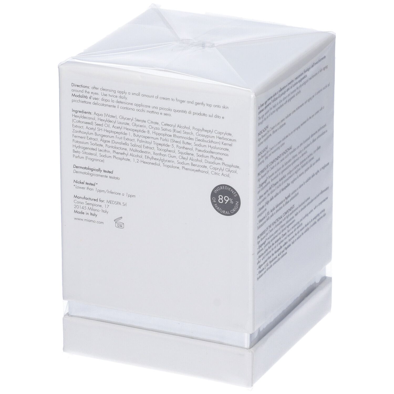 Confezione bianca con informazioni sul prodotto. Scritta: Miamo, Age Reverse Eye Cream, istruzioni.