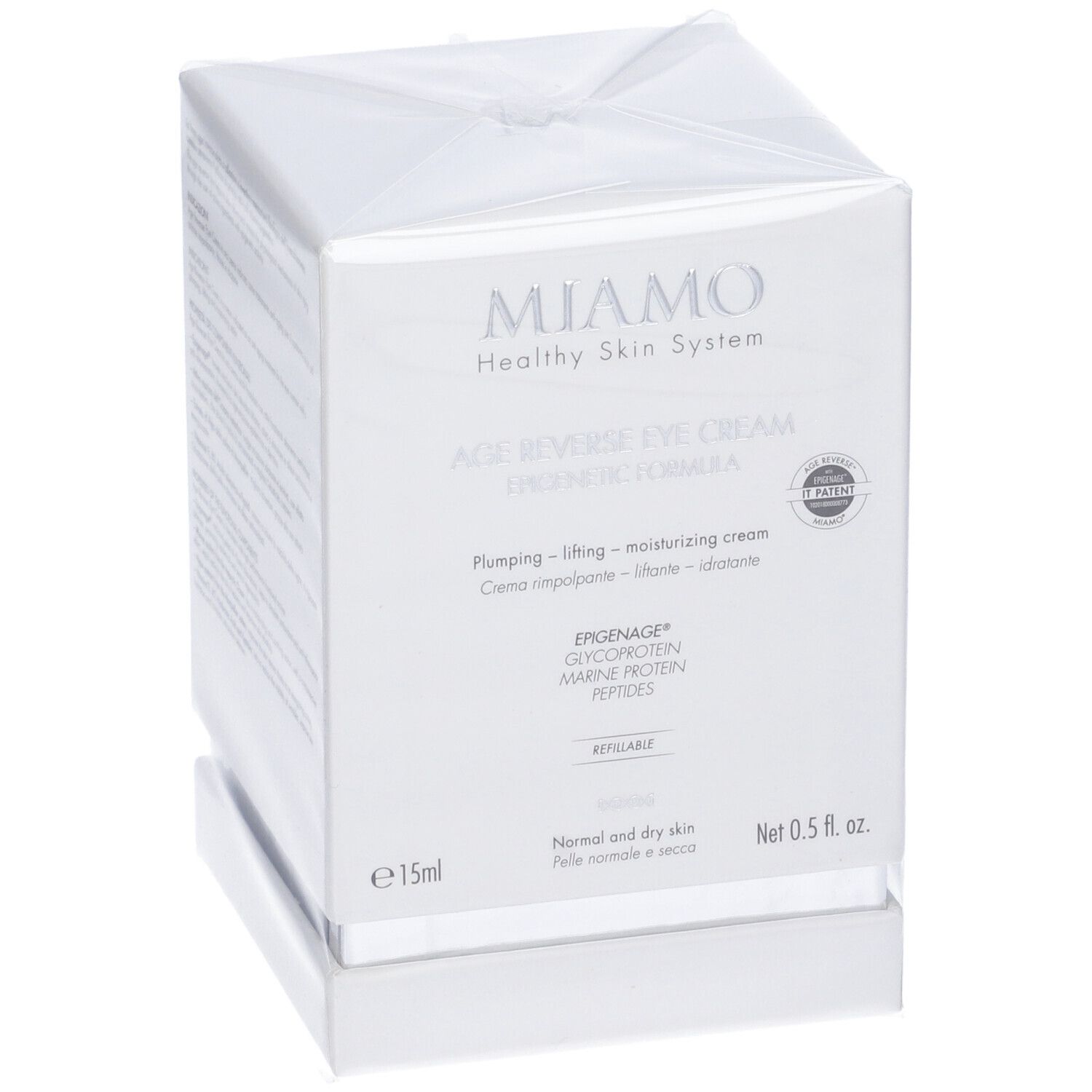 Confezione bianca con informazioni sul prodotto. Scritta: Miamo, Age Reverse Eye Cream, 15ml.