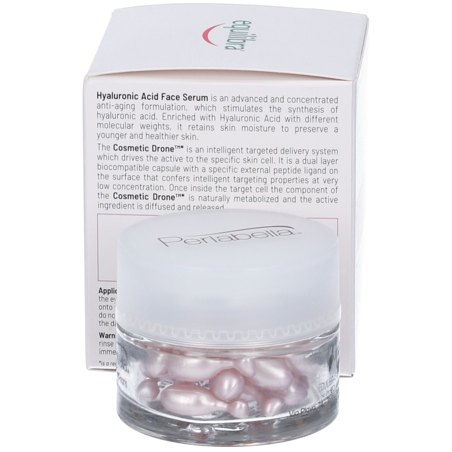 Vasetto con capsule rosa, parzialmente coperto dalla confezione. Sul coperchio, la scritta "Perlabella".