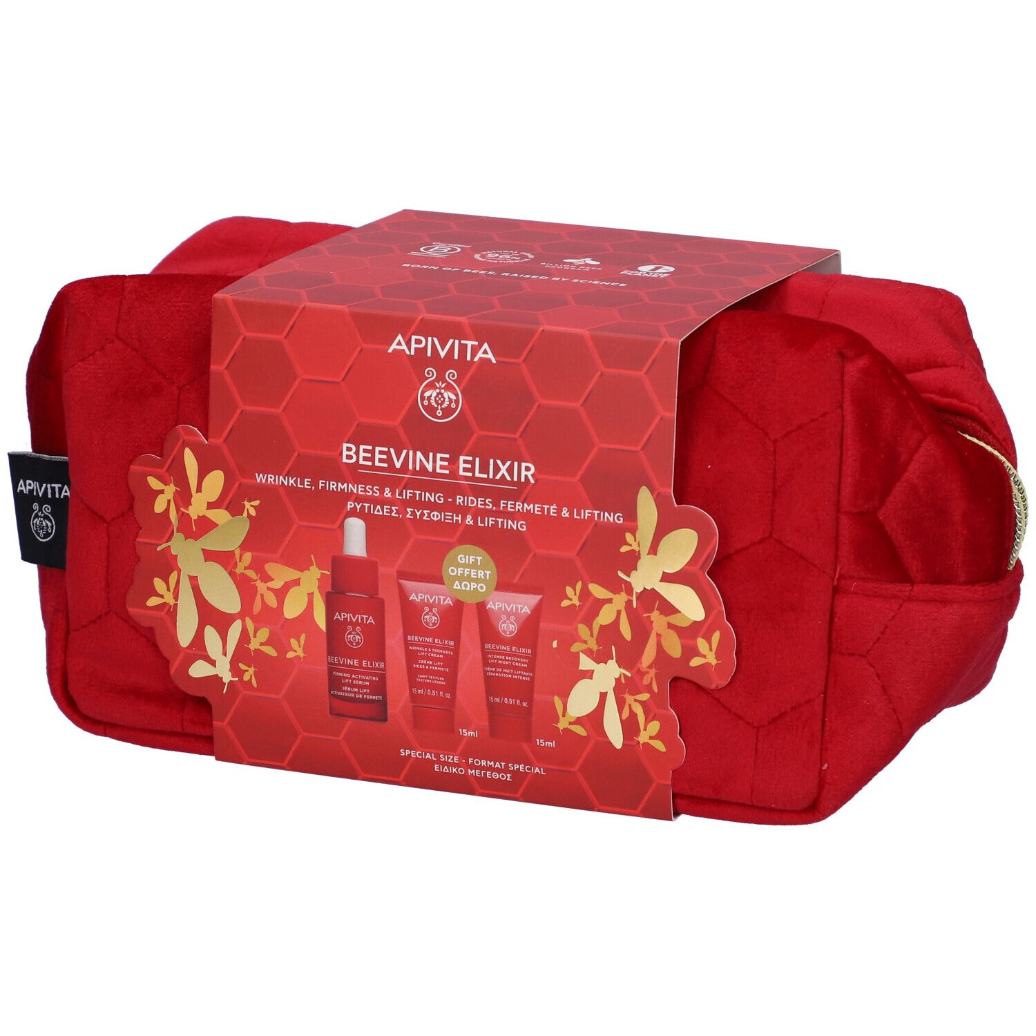 Borsetta rossa con confezione regalo. Scritta: Apivita Beevine Elixir. Contiene siero, crema e crema notte.
