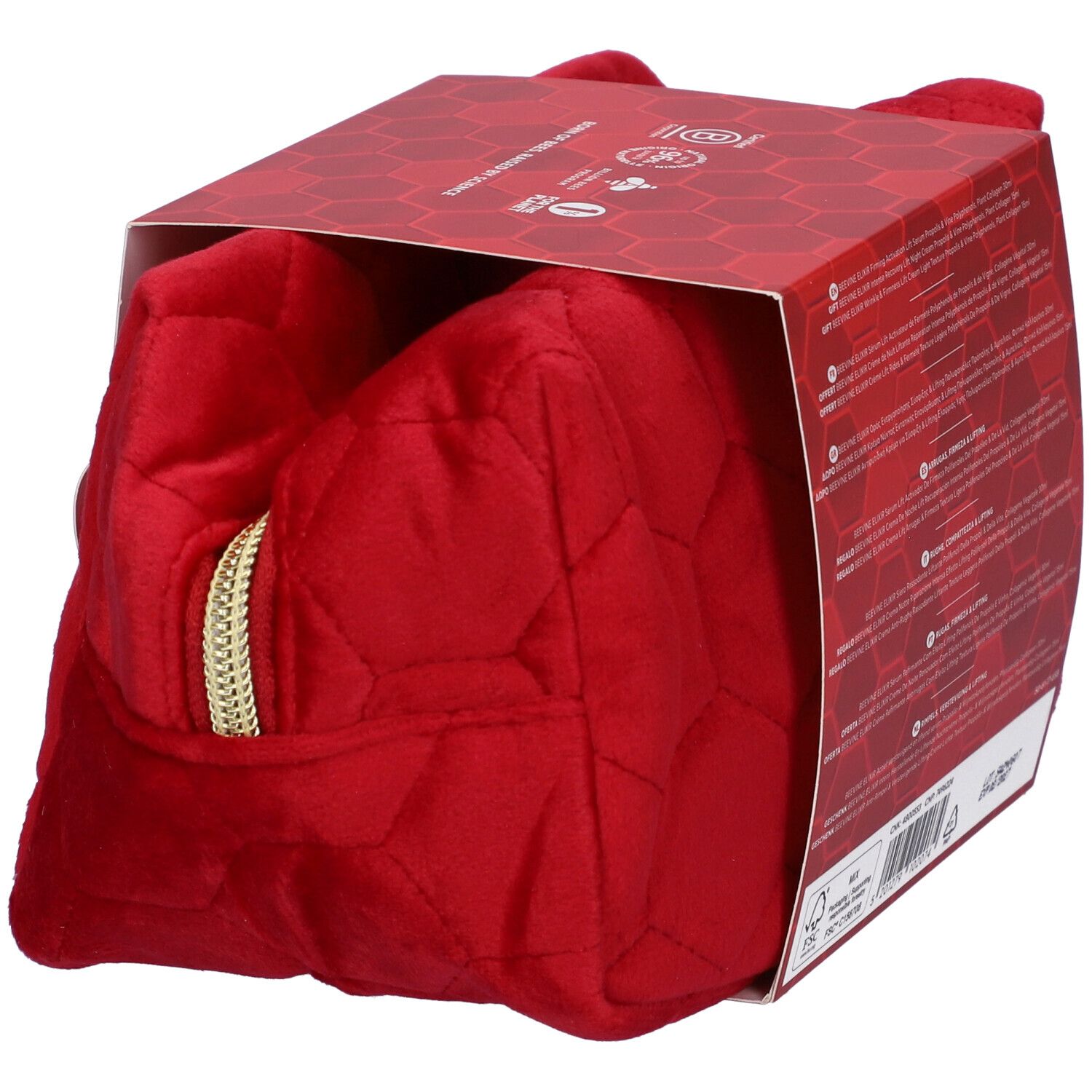Borsetta rossa con confezione regalo. Aperta, mostra i prodotti. Cerniera dorata.