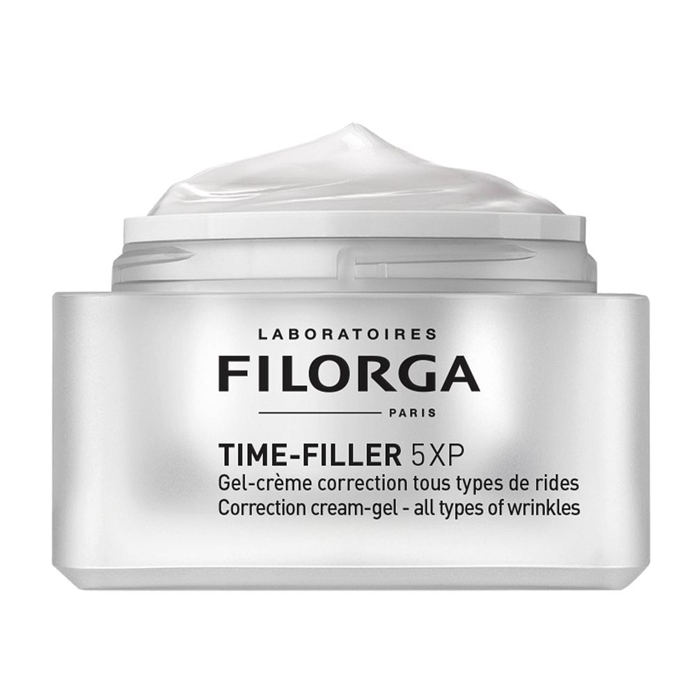 Creme-Gel-Tiegel. Weißer Tiegel mit silbernem Deckel. Creme auf dem Deckel. Schwarze Schrift: FILORGA, TIME-FILLER 5XP.