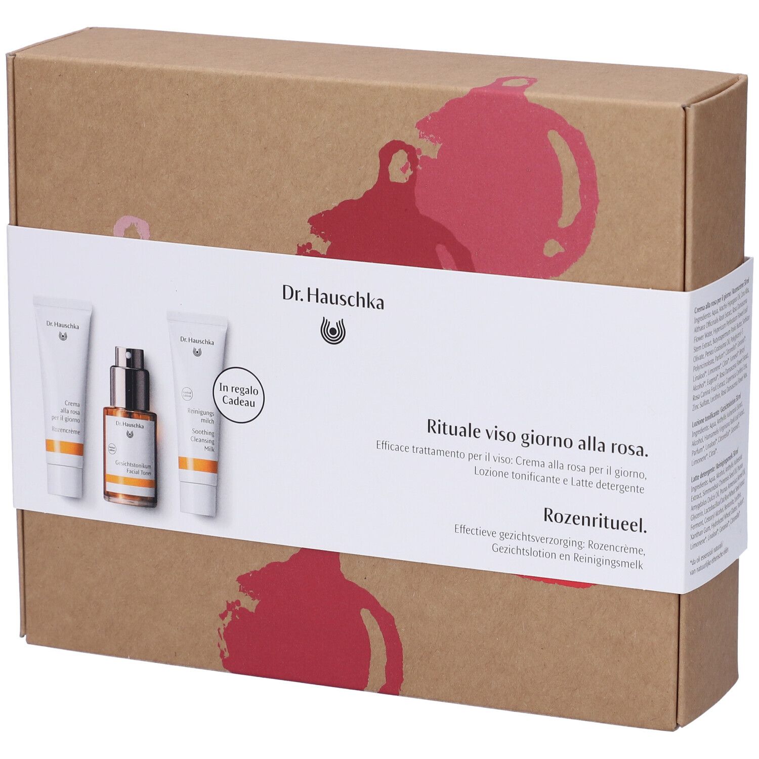 Set regalo con tre prodotti. Scritta: Dr. Hauschka. Rituale alla rosa. Creme e lozioni confezionate in scatola.