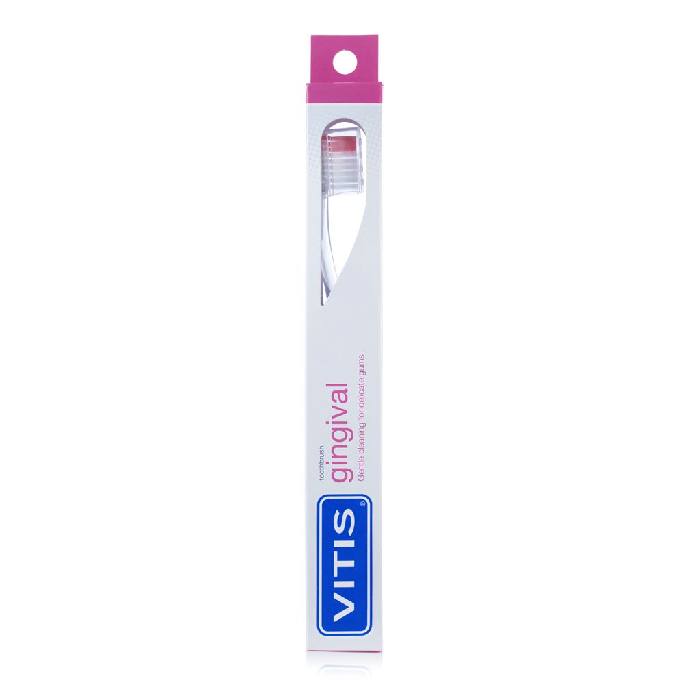 Spazzolino in confezione. Confezione bianca e rosa con logo VITIS. Visibile: spazzolino con manico trasparente e testina rossa.